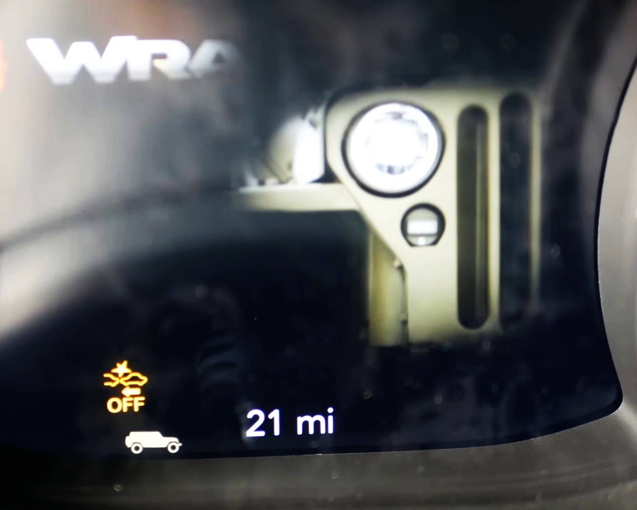 Jeep Wrangler JL Easter Egg Jeep driving across screen bottom and Willys