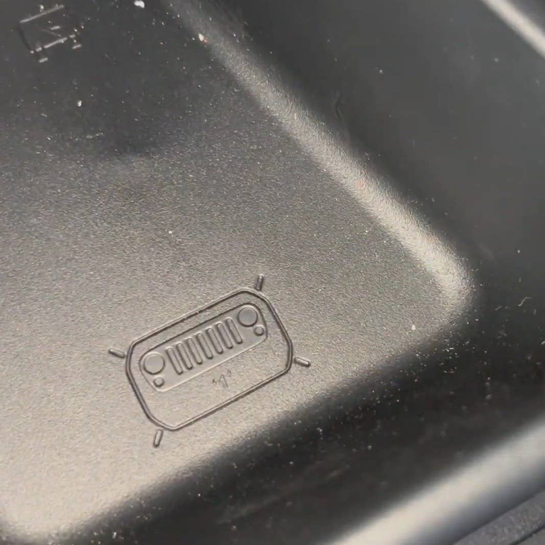 2022 Jeep Compass Easter Eggs Jeep grille in trunk cubby