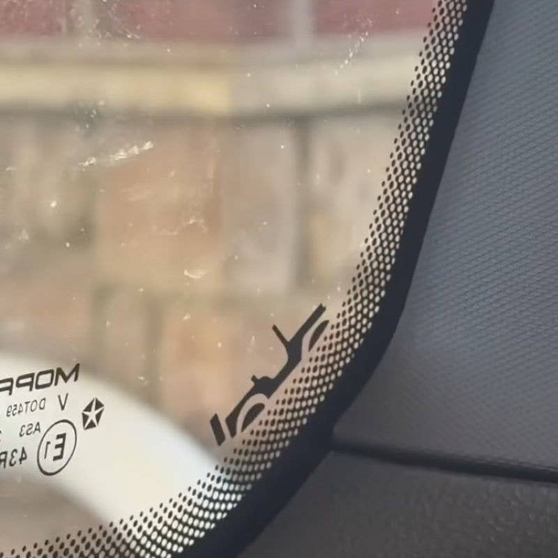 2022 Jeep Grand Cherokee Easter Eggs flat-fender Willys in left rear side glass