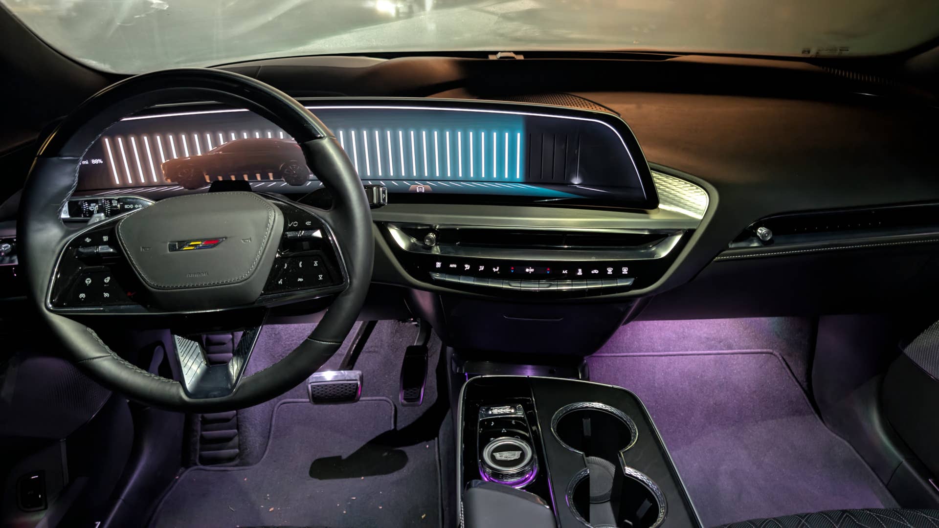 The interior of the 2026 Cadillac Lyriq-V at night