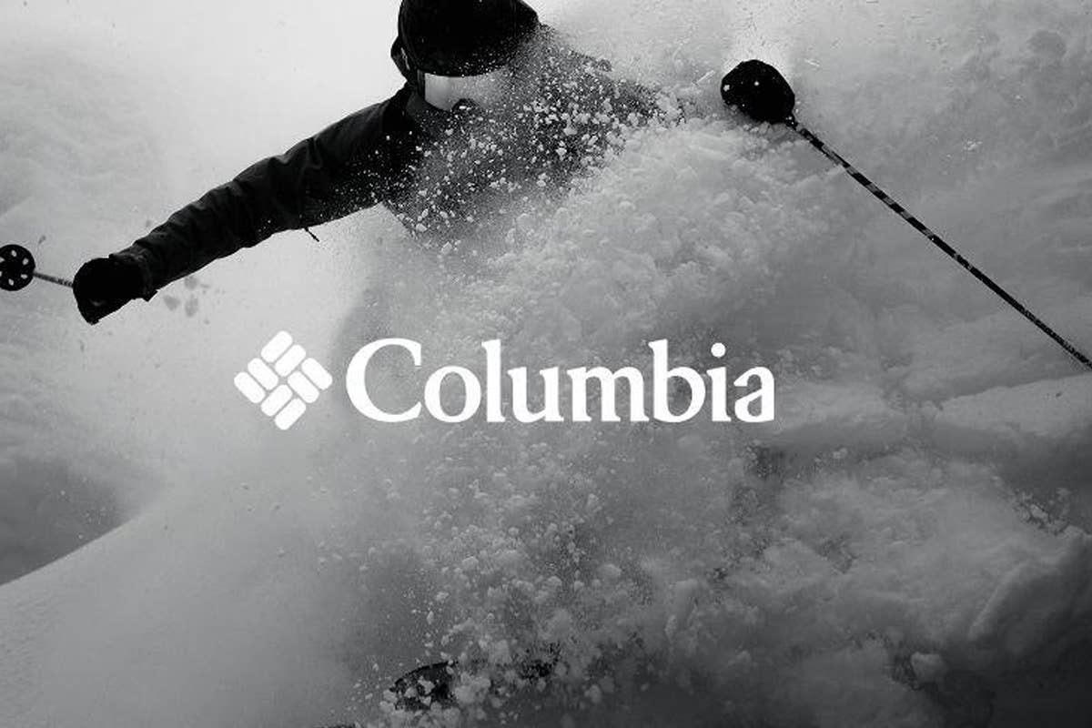 The Columbia logo with a skier in the background
