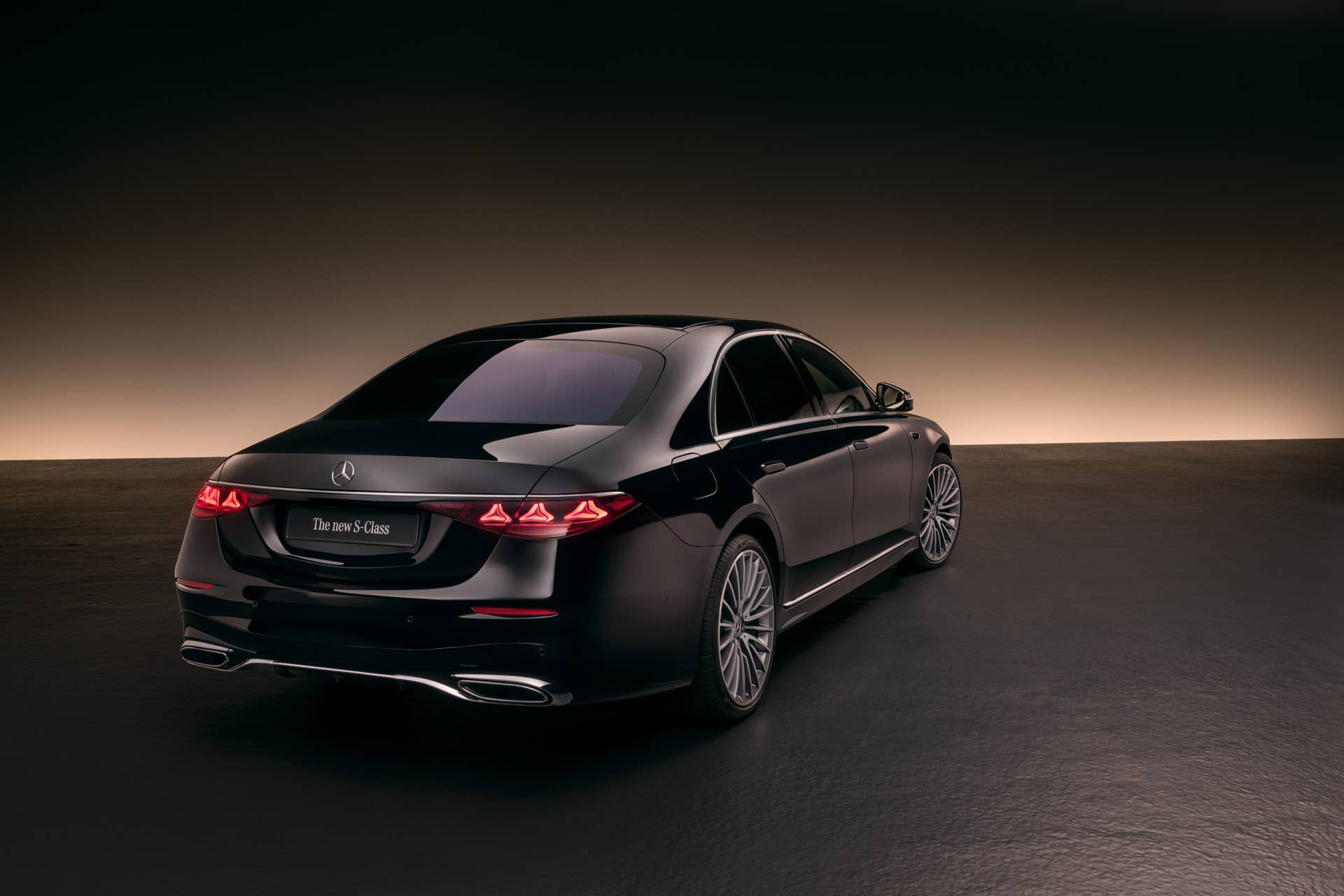 2027 Mercedes-Benz S-Class in black rear angled view