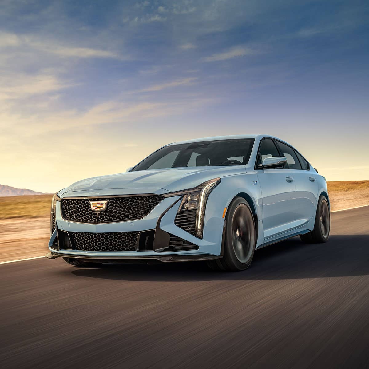 2025 Cadillac CT5 V Blackwing light blue front angled view driving
