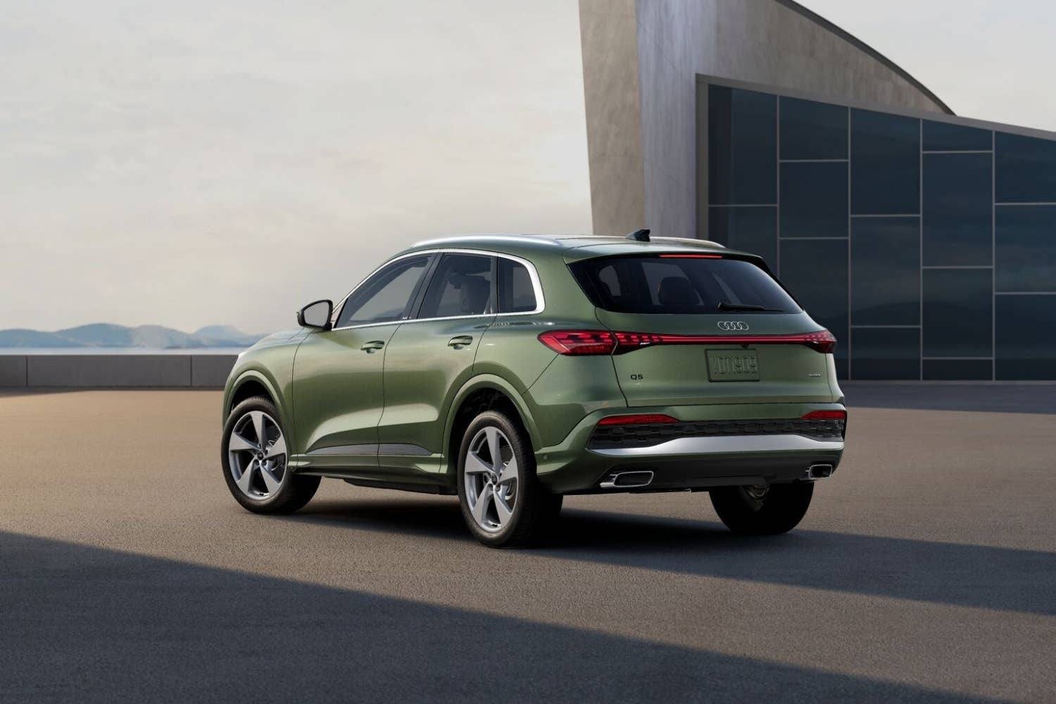 2026 Audi Q5 Premium Plus green rear angled view