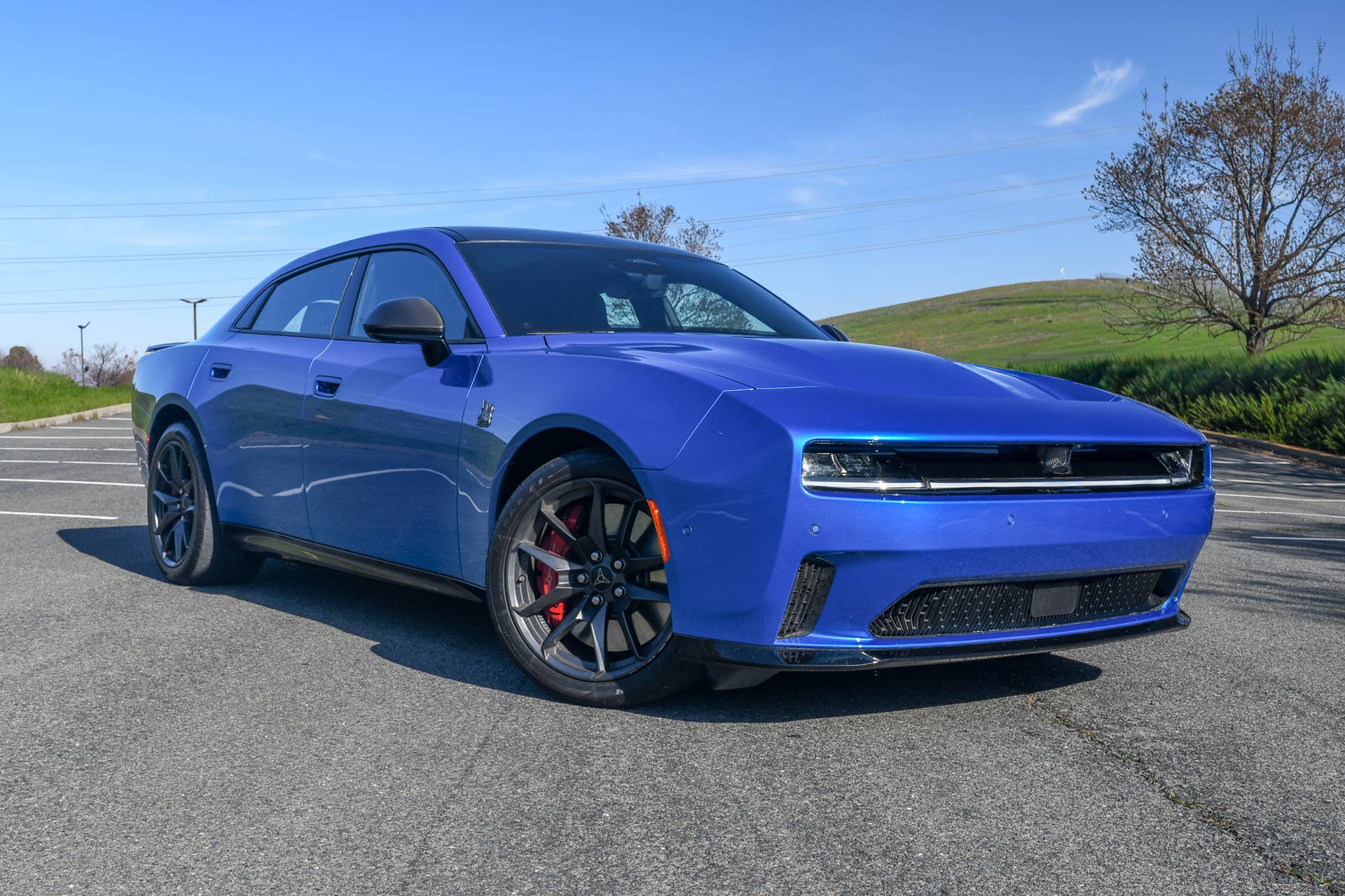 The front quarter end of the 2026 Dodge Charger EV Daytona Scat Pack with the Track Package
