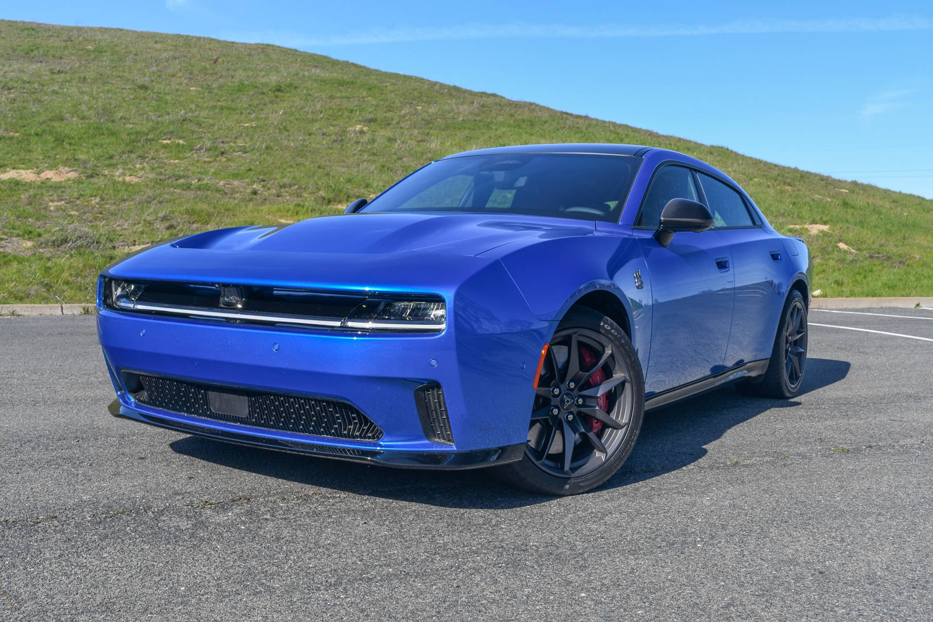 The front quarter end of the 2026 Dodge Charger EV Daytona Scat Pack with the Track Package