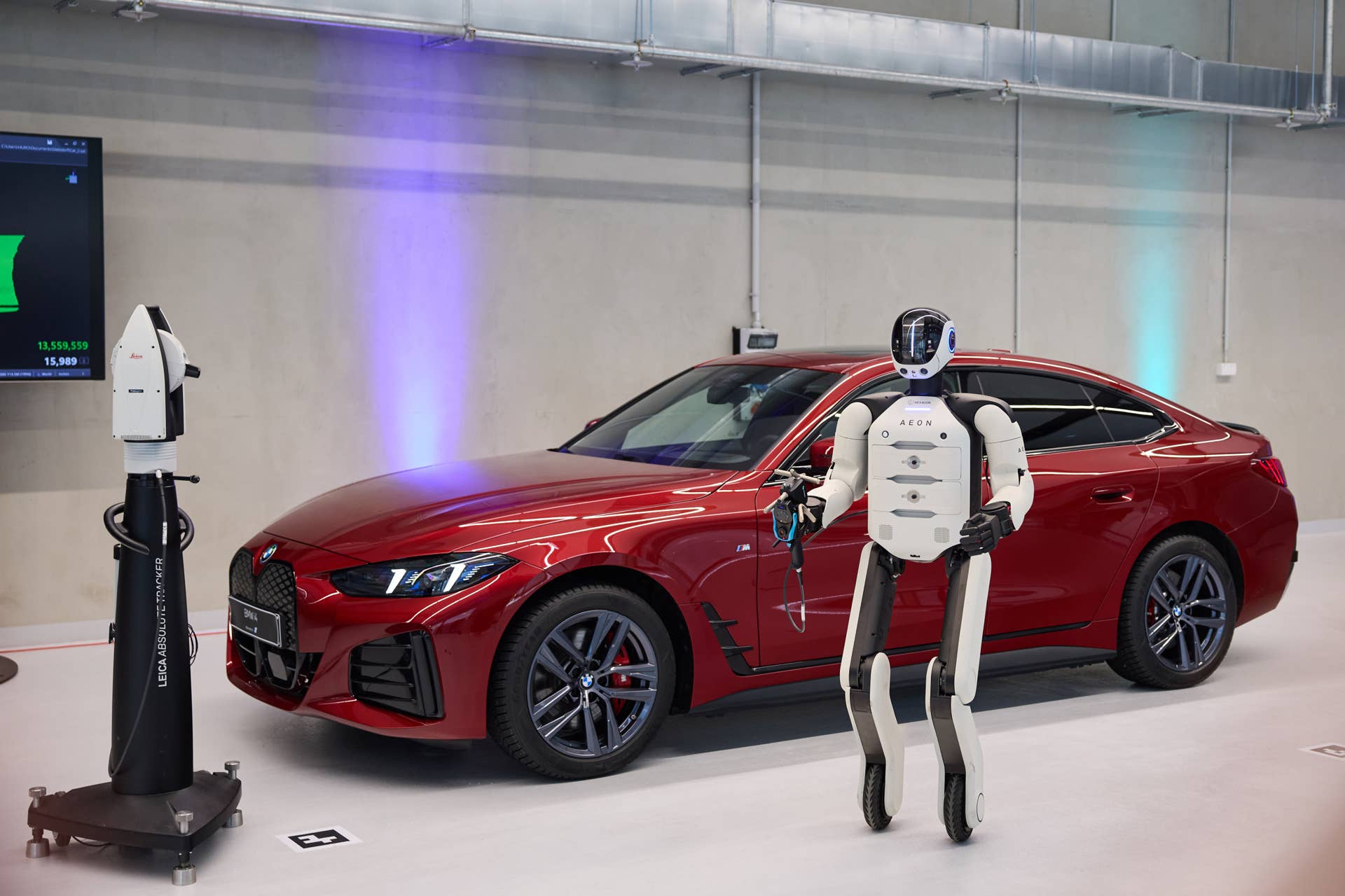 Humanoid Robot Standing in front of Red BMW i4