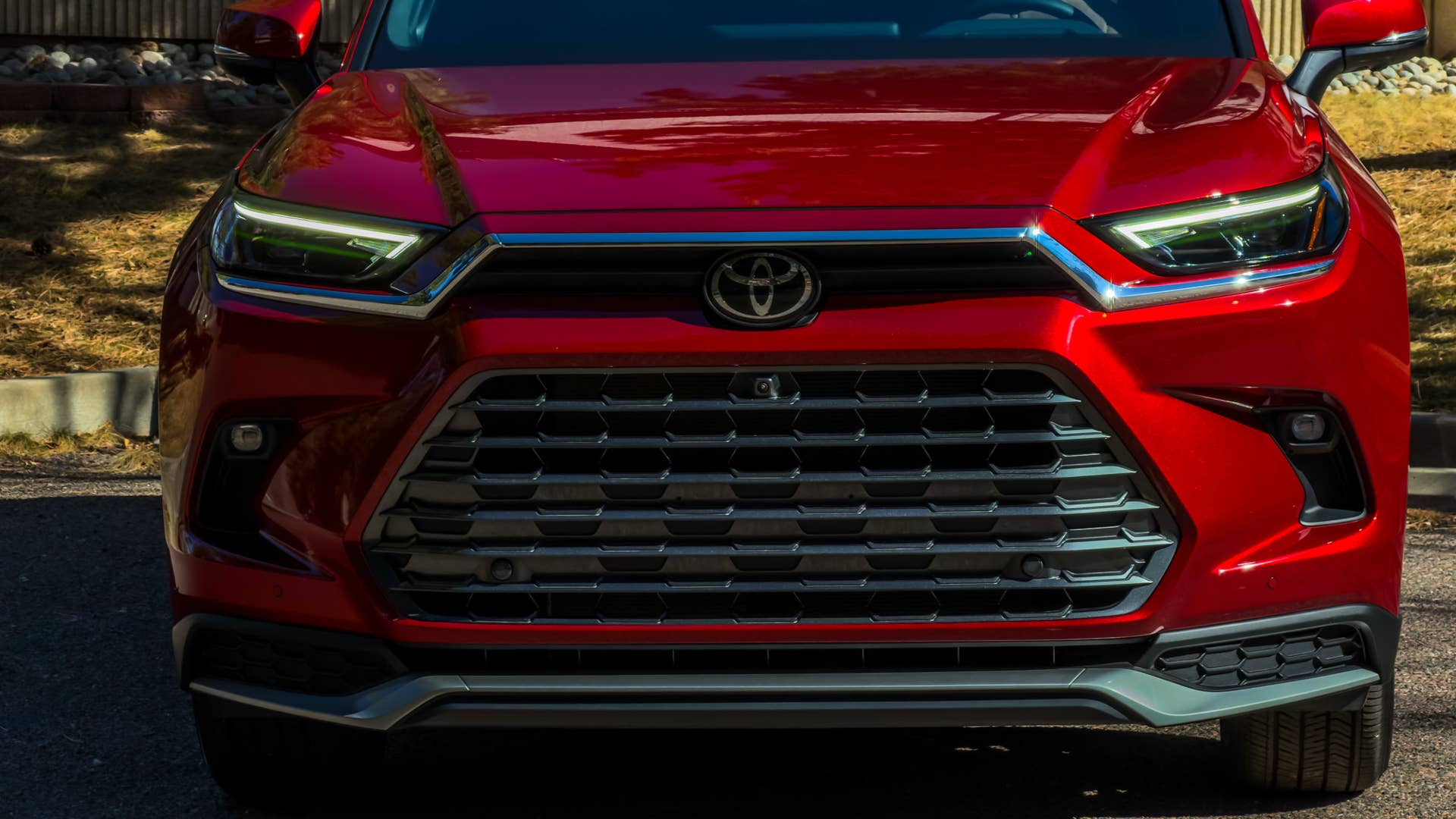 2026 Toyota Grand Highlander Hybrid MAX Platinum in Ruby Flare Pearl front view