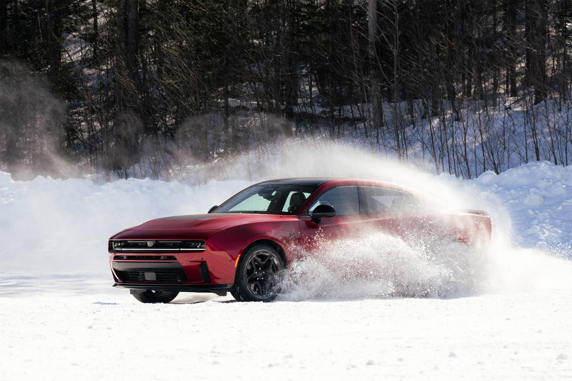 2026 Dodge Charger R/T 4-door red front angled view snow driving