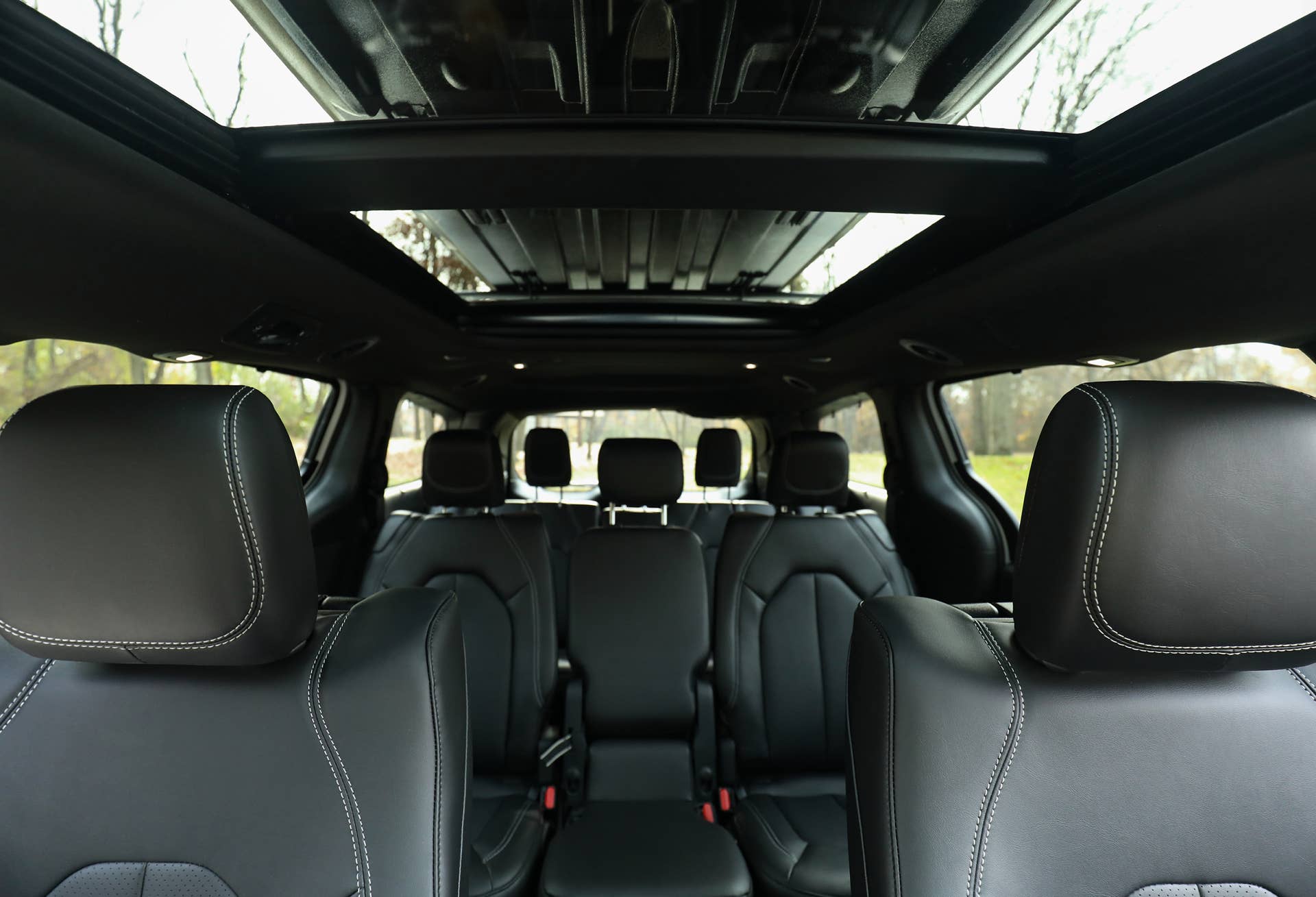 2027 Chrysler Pacifica Select 8-seater black interior rearward view