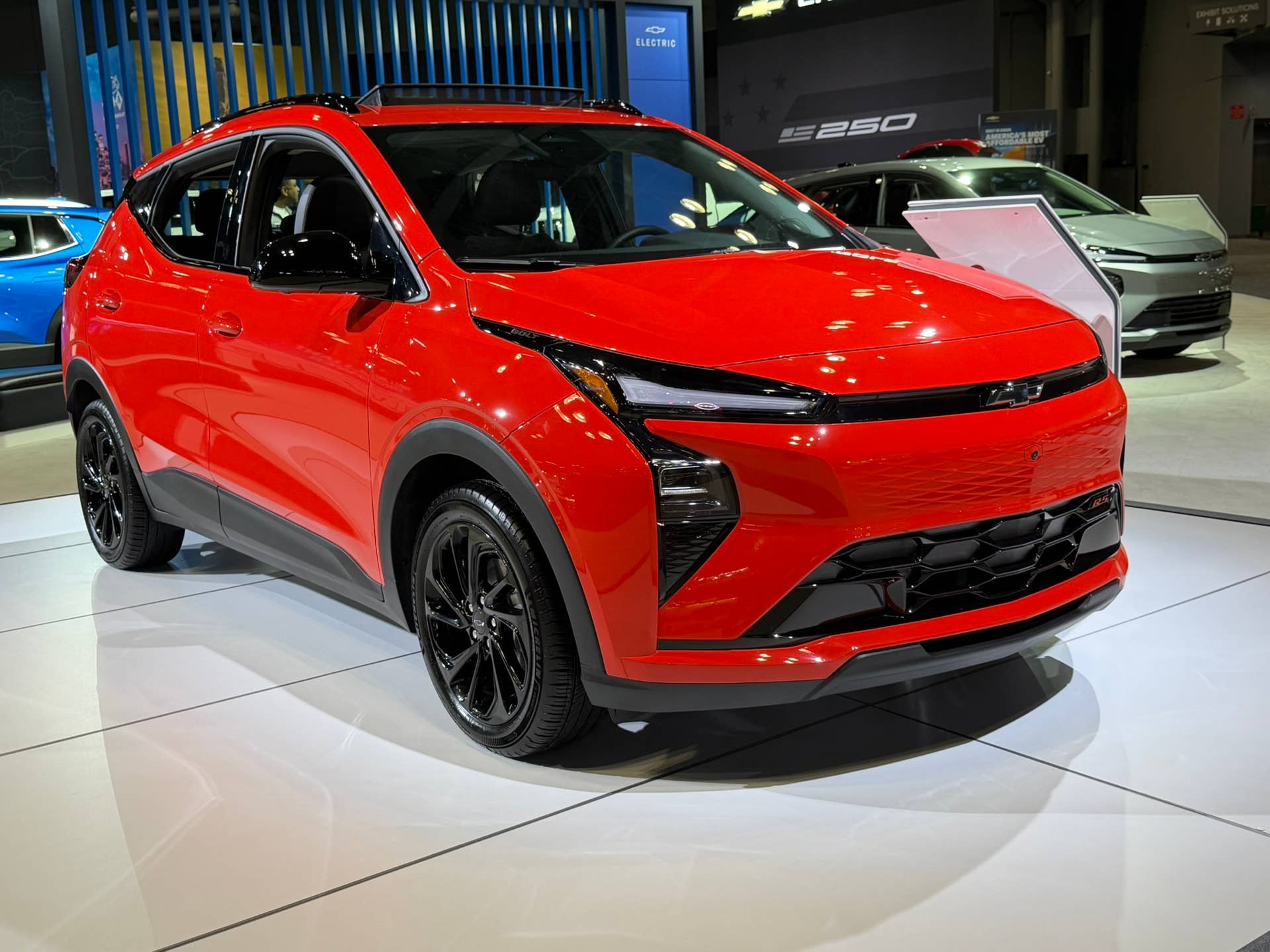 2027 Chevrolet Bolt RS red front angled view