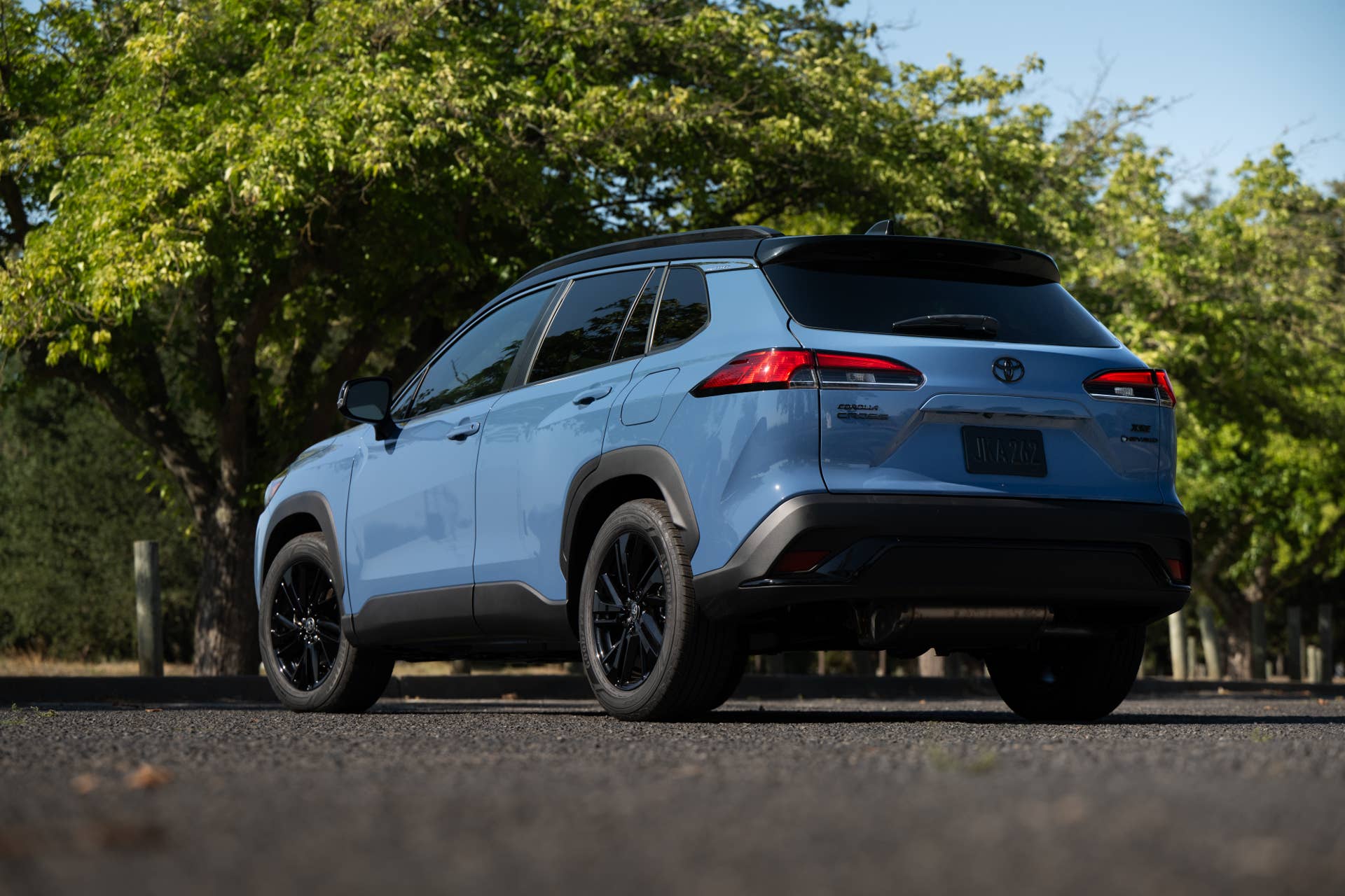 2026 Toyota Corolla Cross Hybrid XSE in Cavalry Blue rear angled view