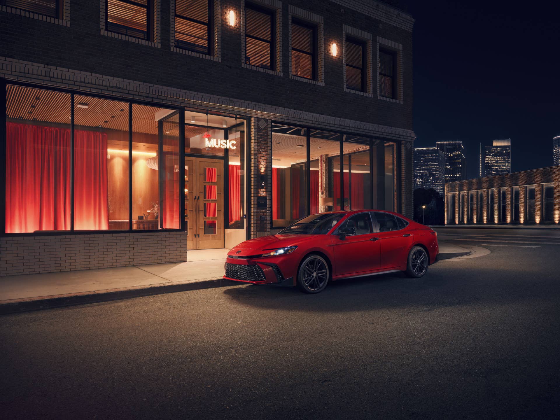 2025-2026 Toyota Camry red front angled view