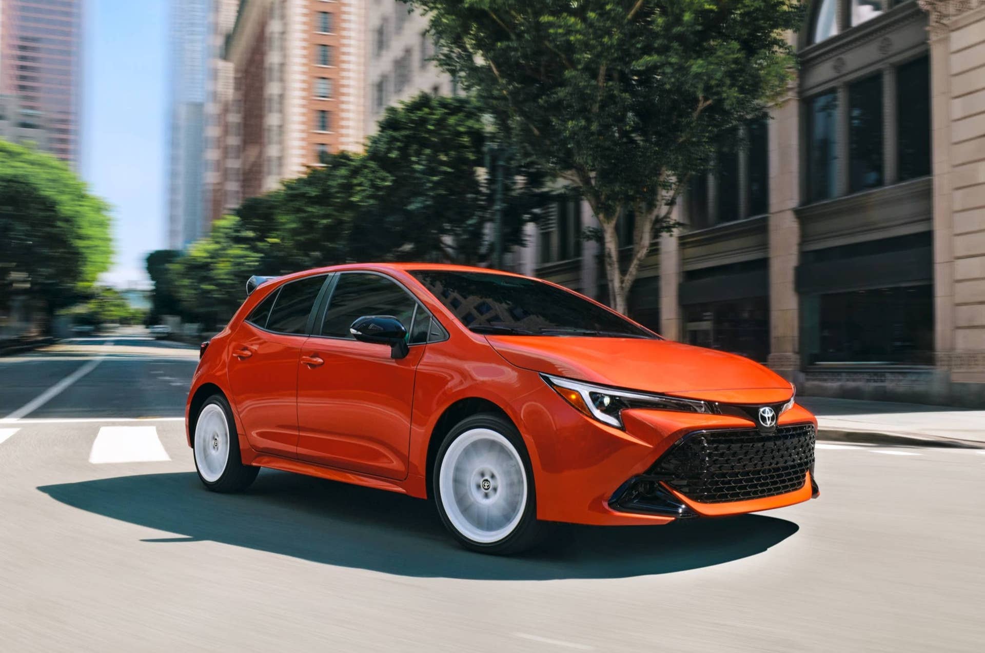 Toyota Corolla Hatchback FX in Inferno front angled view
