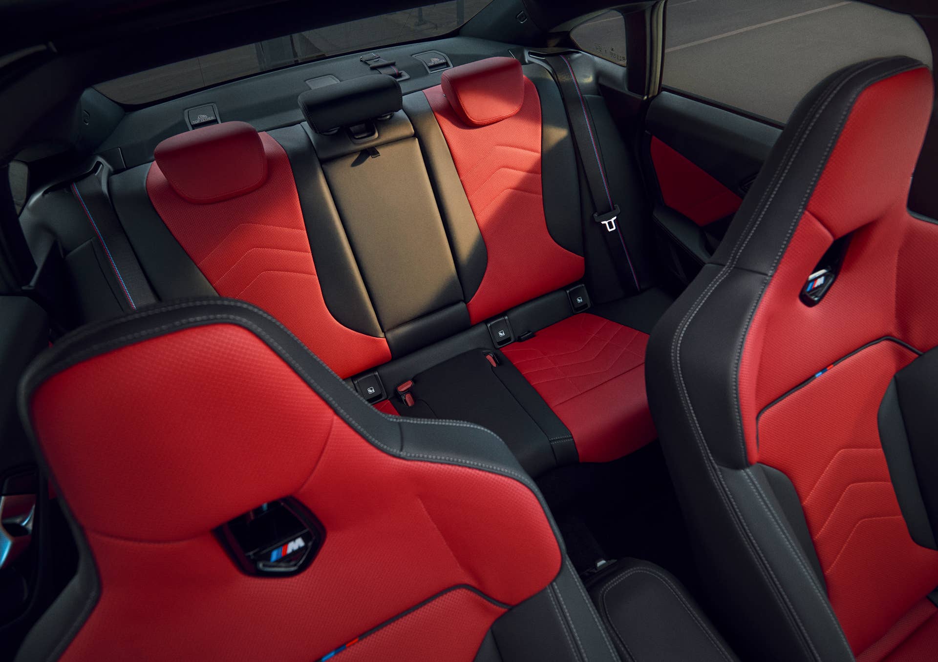 2025-2026 BMW 2 Series Gran Coupe with red and black interior rear seats
