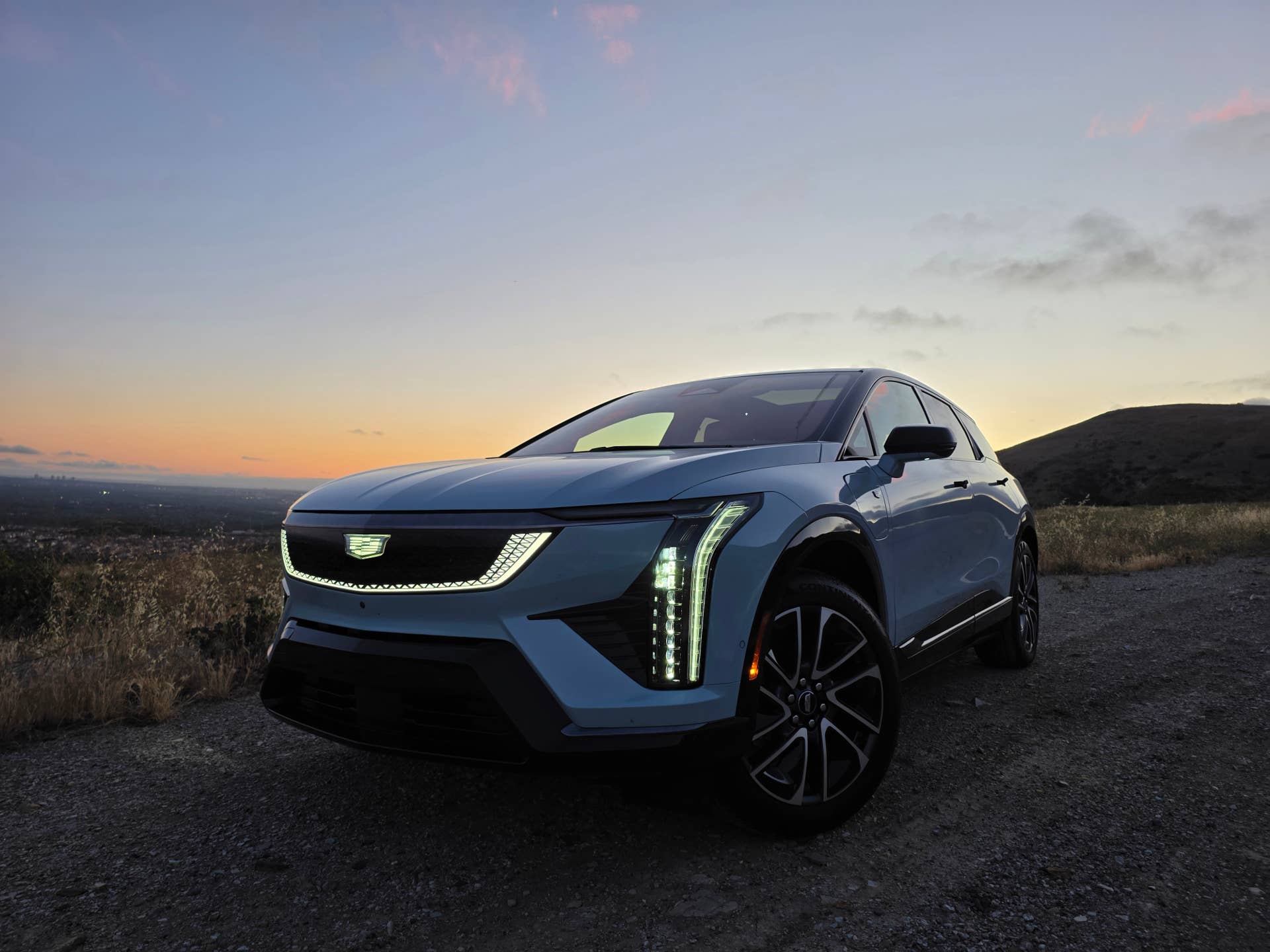 2026 Cadillac Optiq Premium Sport silver front angled view