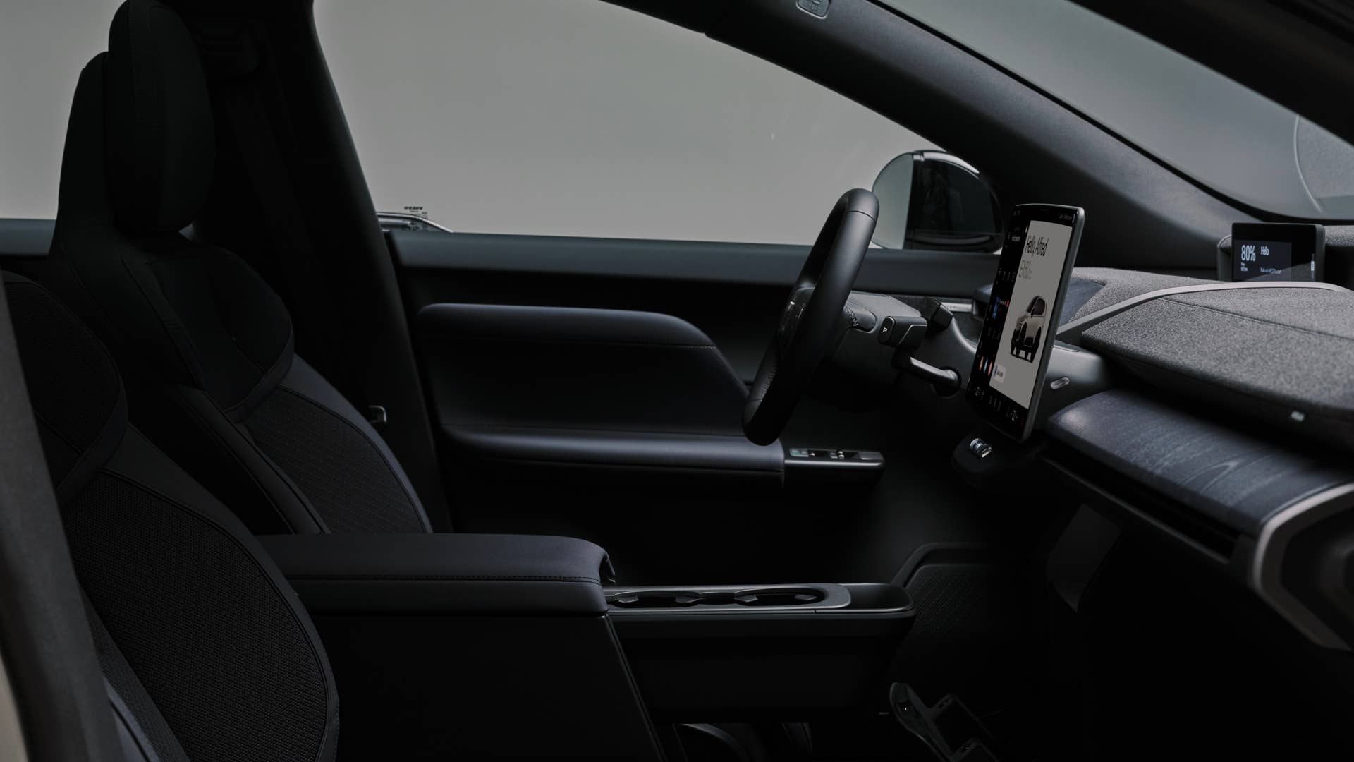 2027 Volvo EX60 Cross Country black interior front cabin side view