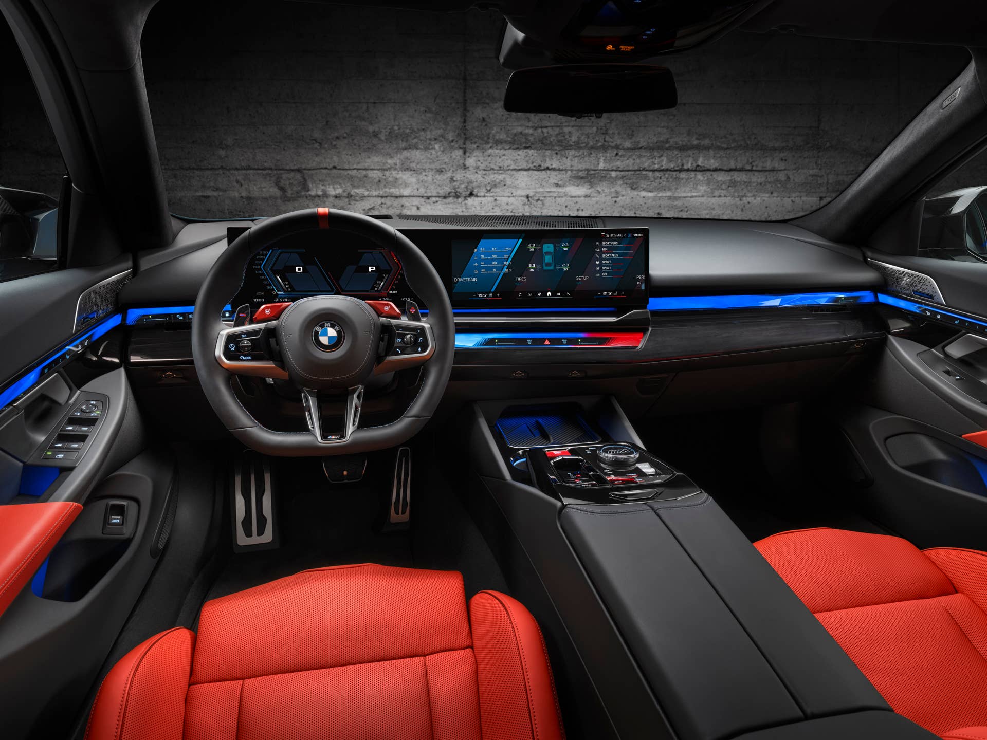 2026 BMW M5 Touring with red/black interior front cabin