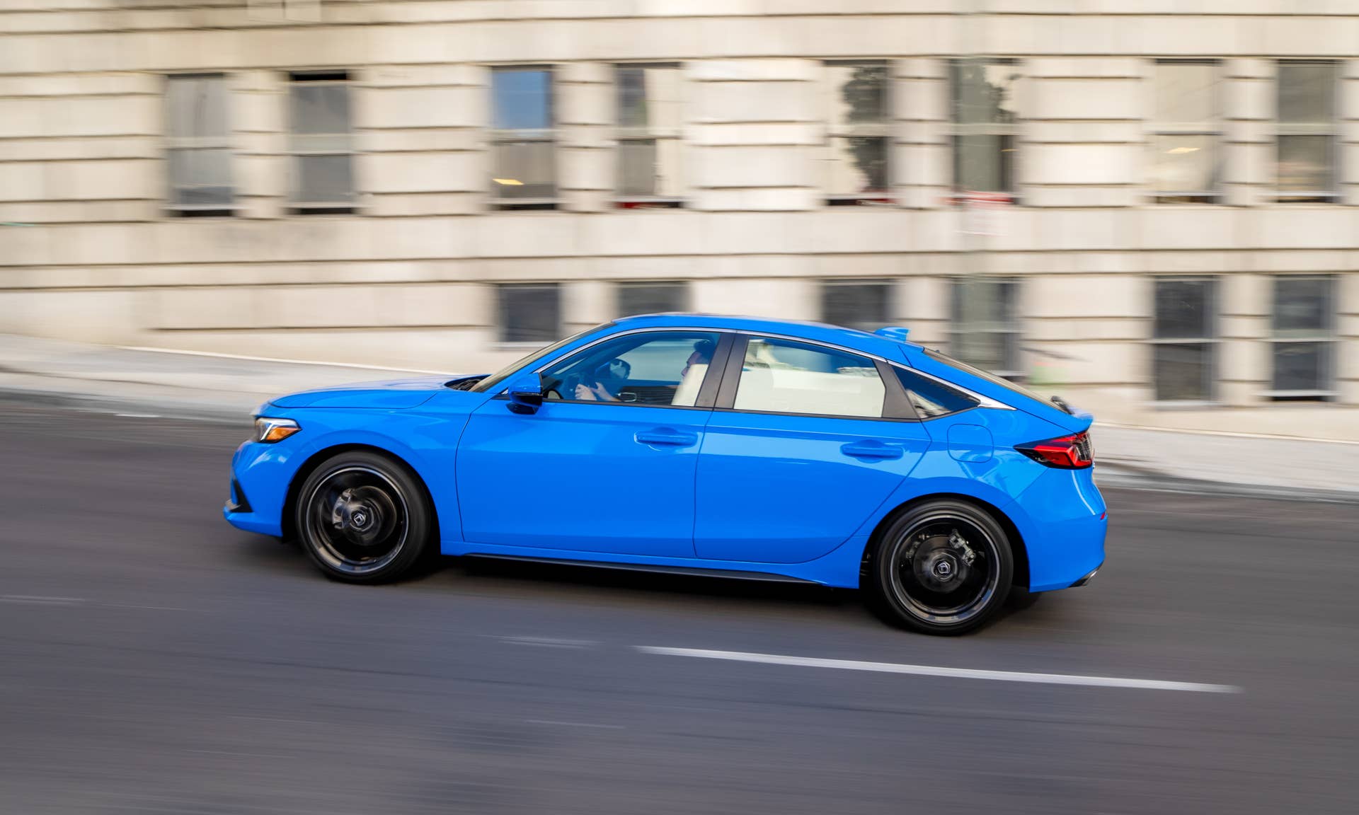 The side profile of the 2026 Honda Civic Hatchback Hybrid