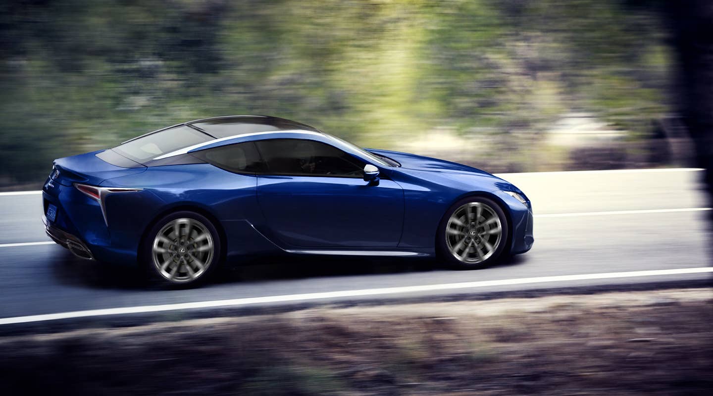 2025 Lexus LC Coupe blue side view driving