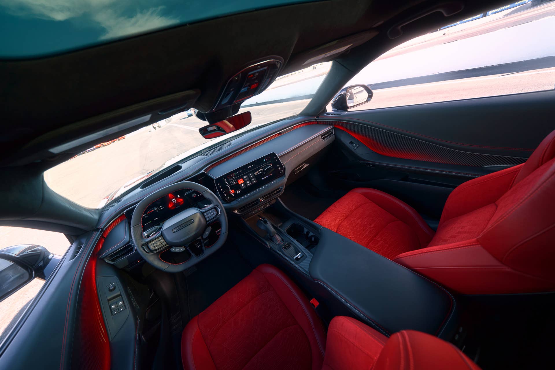 2025-2026 Dodge Charger Daytona EV Scat Pack black and Demonic Red interior front cabin
