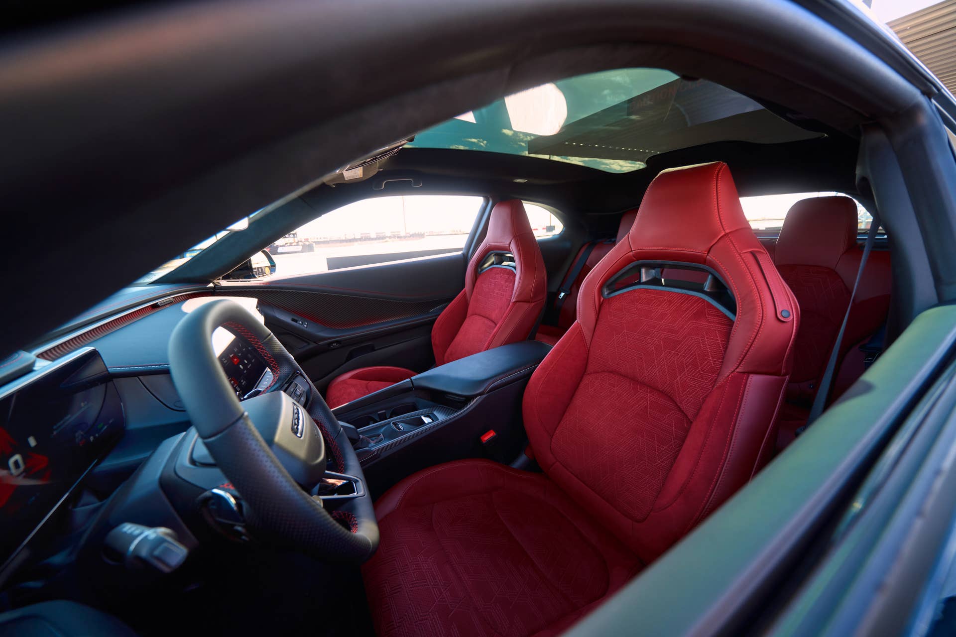 2025-2026 Dodge Charger Daytona EV Scat Pack black and Demonic Red interior front seats