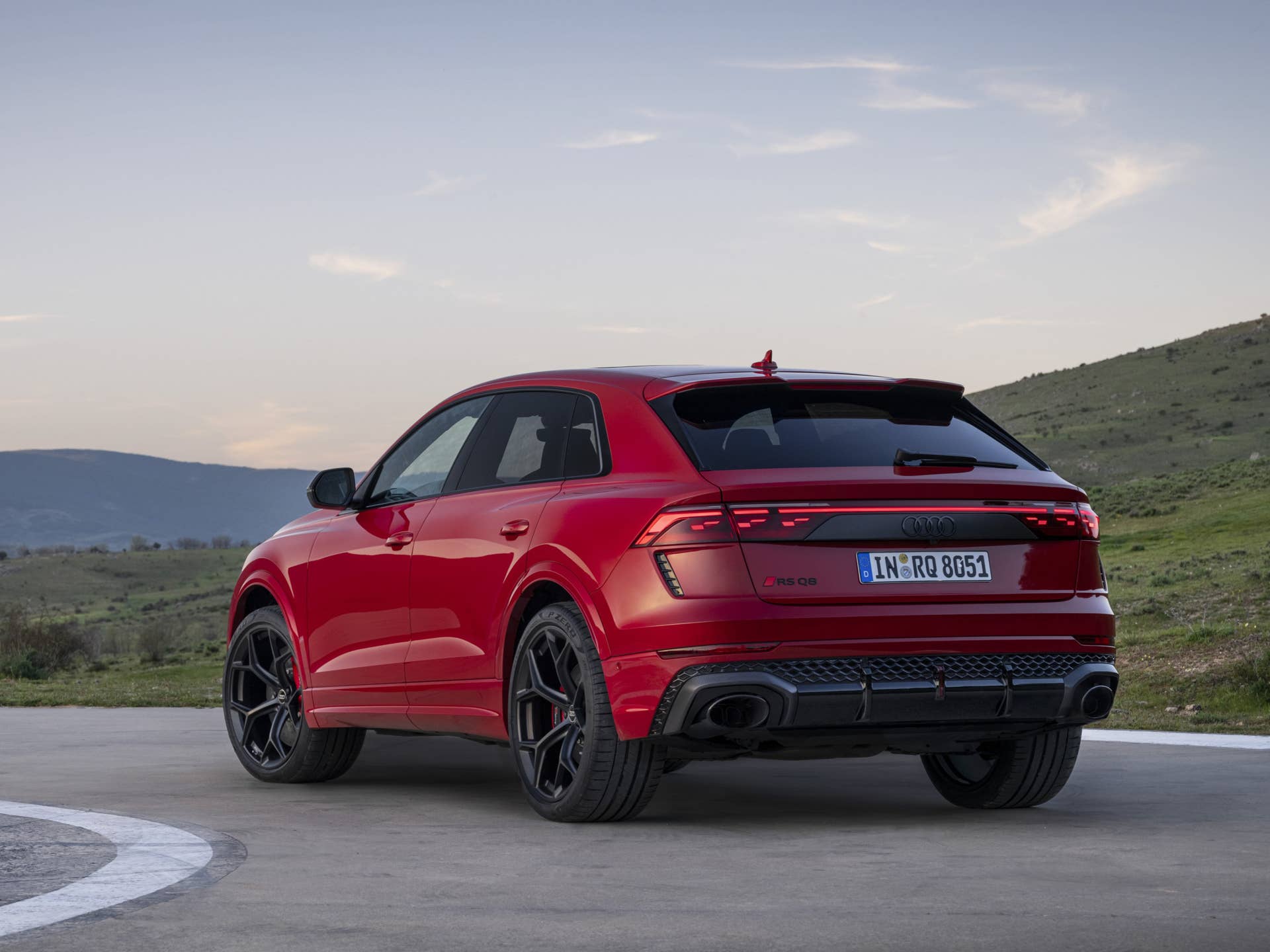 2025-2026 Audi RS Q8 Performance Chilli Red Metallic rear angled view