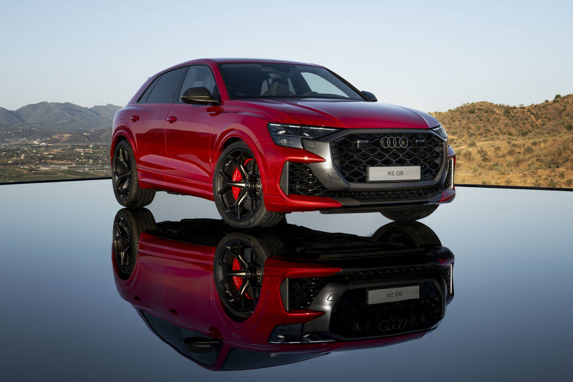 2025-2026 Audi RS Q8 Performance Chilli Red Metallic front angled view
