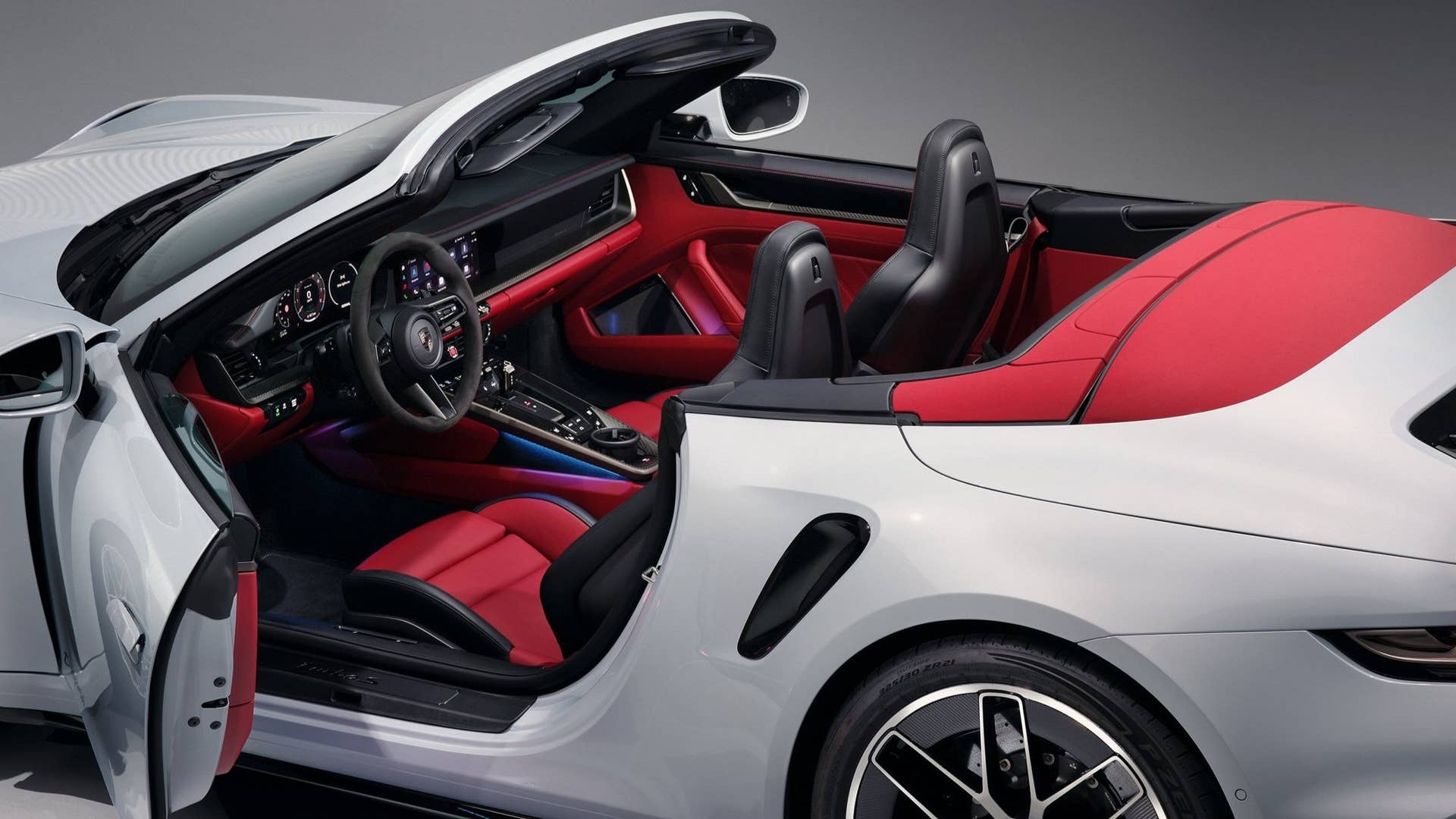 2026 Porsche 911 Turbo S Cabriolet red and black interior door open