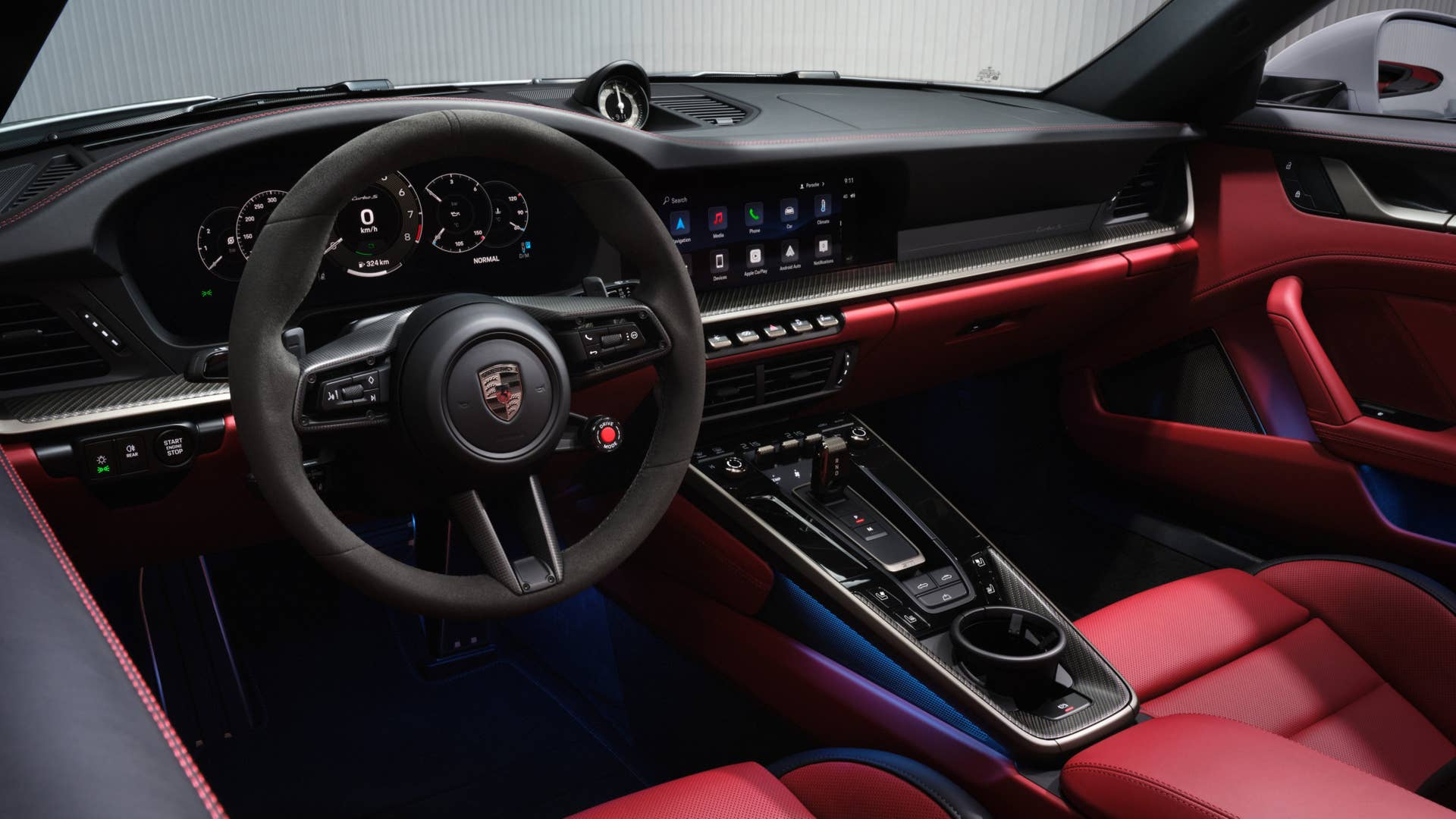2026 Porsche 911 Turbo S red and black interior front cabin