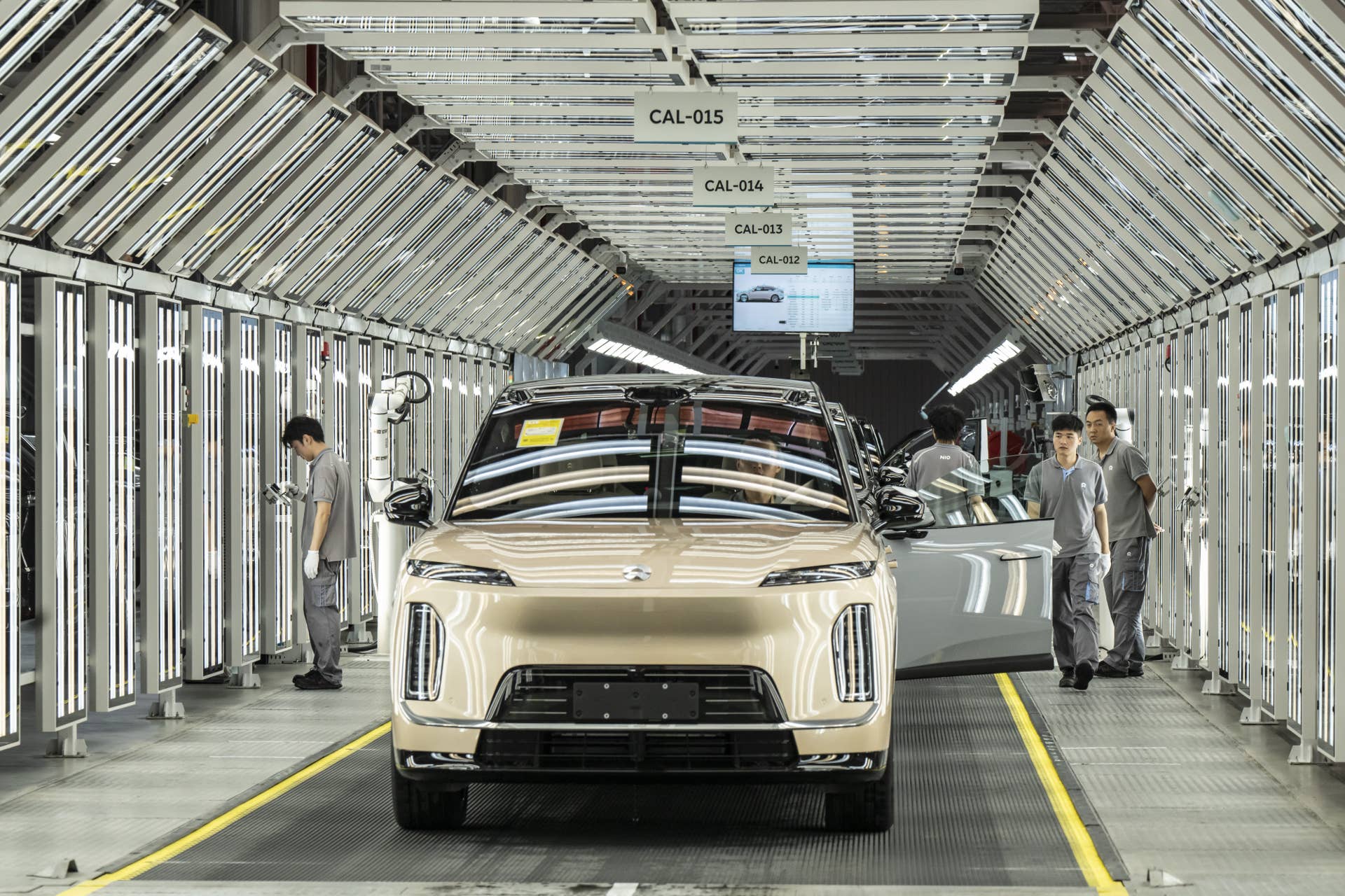 Employees on the production line of the Nio Inc. ES9 electric vehicle at the company's factory in Hefei, Anhui Province, China, on Tuesday, May 19, 2026. Nio is expected to report results on May 21. Photographer: Qilai Shen/Bloomberg via Getty Images