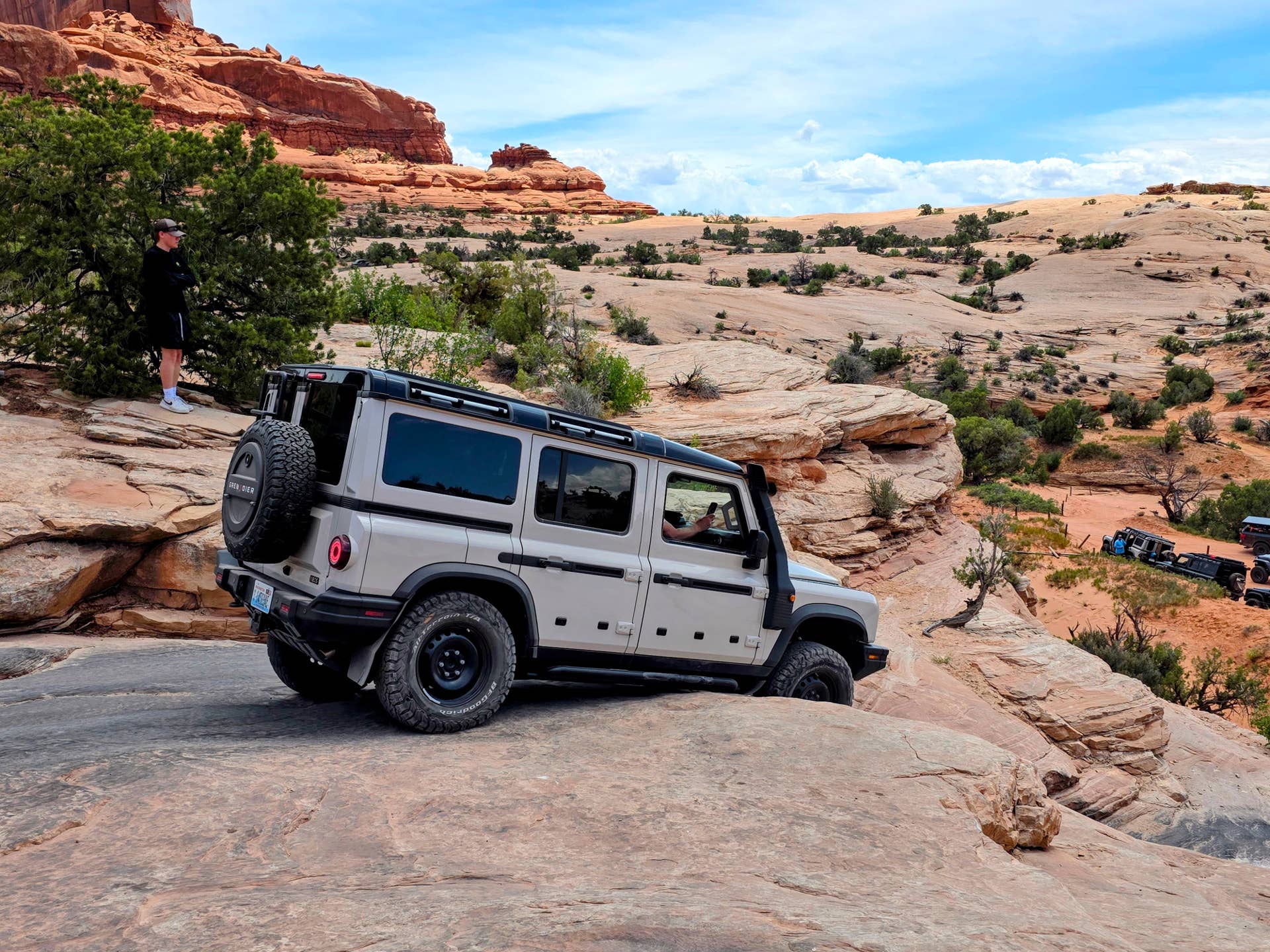 INEOS Grenadier Station Wagon Trialmaster Edition rear angled view off-road driving