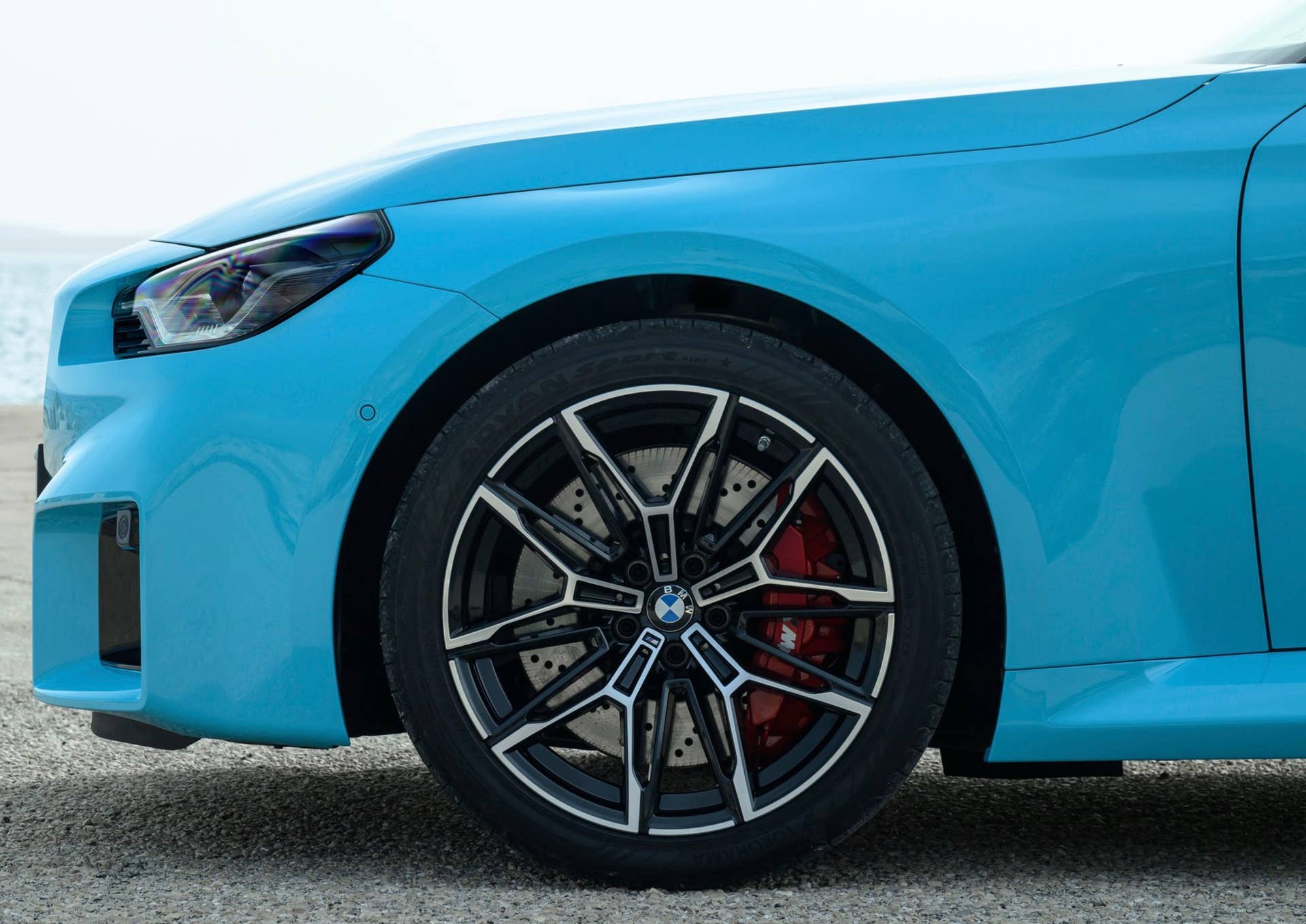 2027 BMW M2 xDrive in blue front wheel