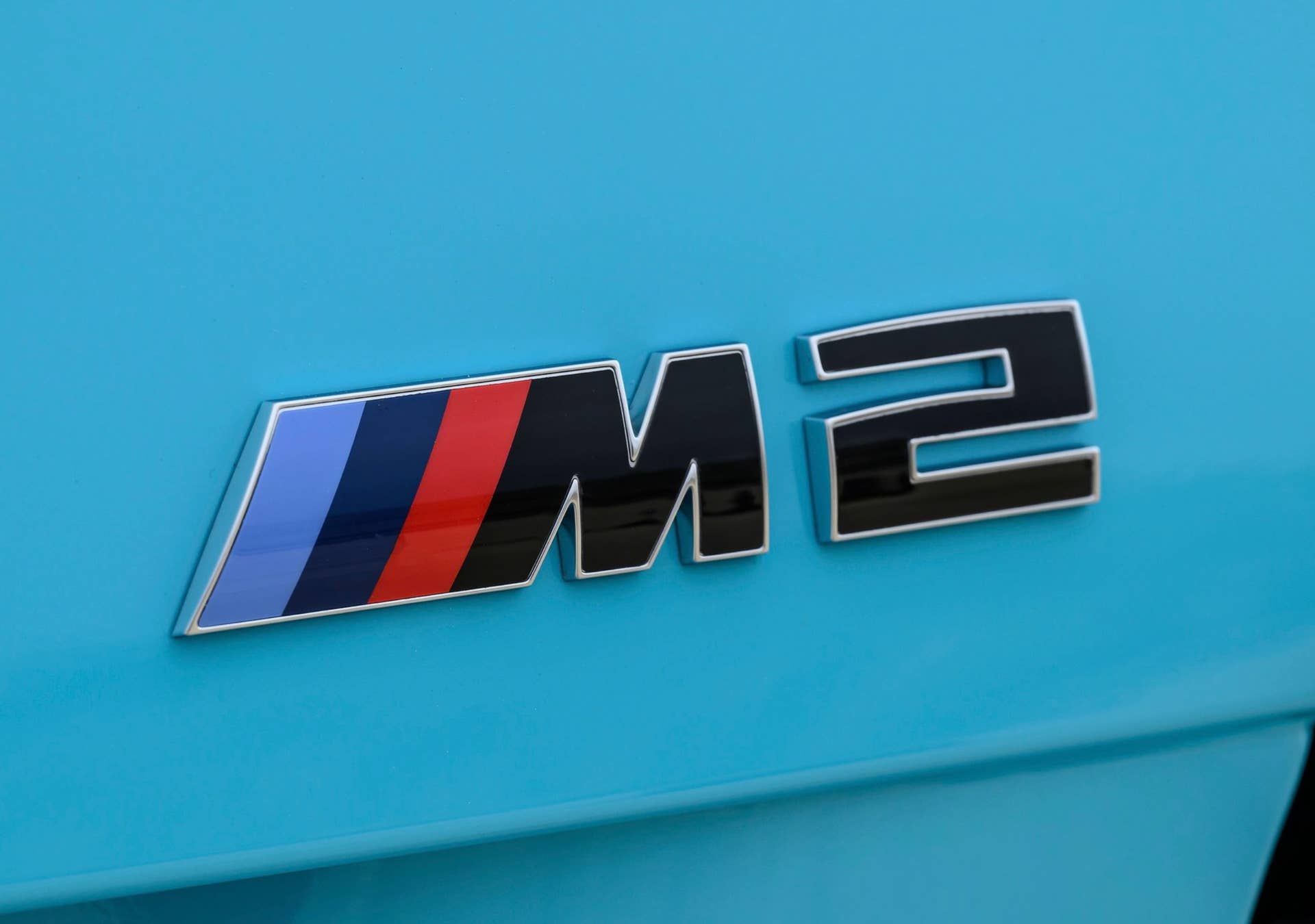 2027 BMW M2 xDrive in blue model badge