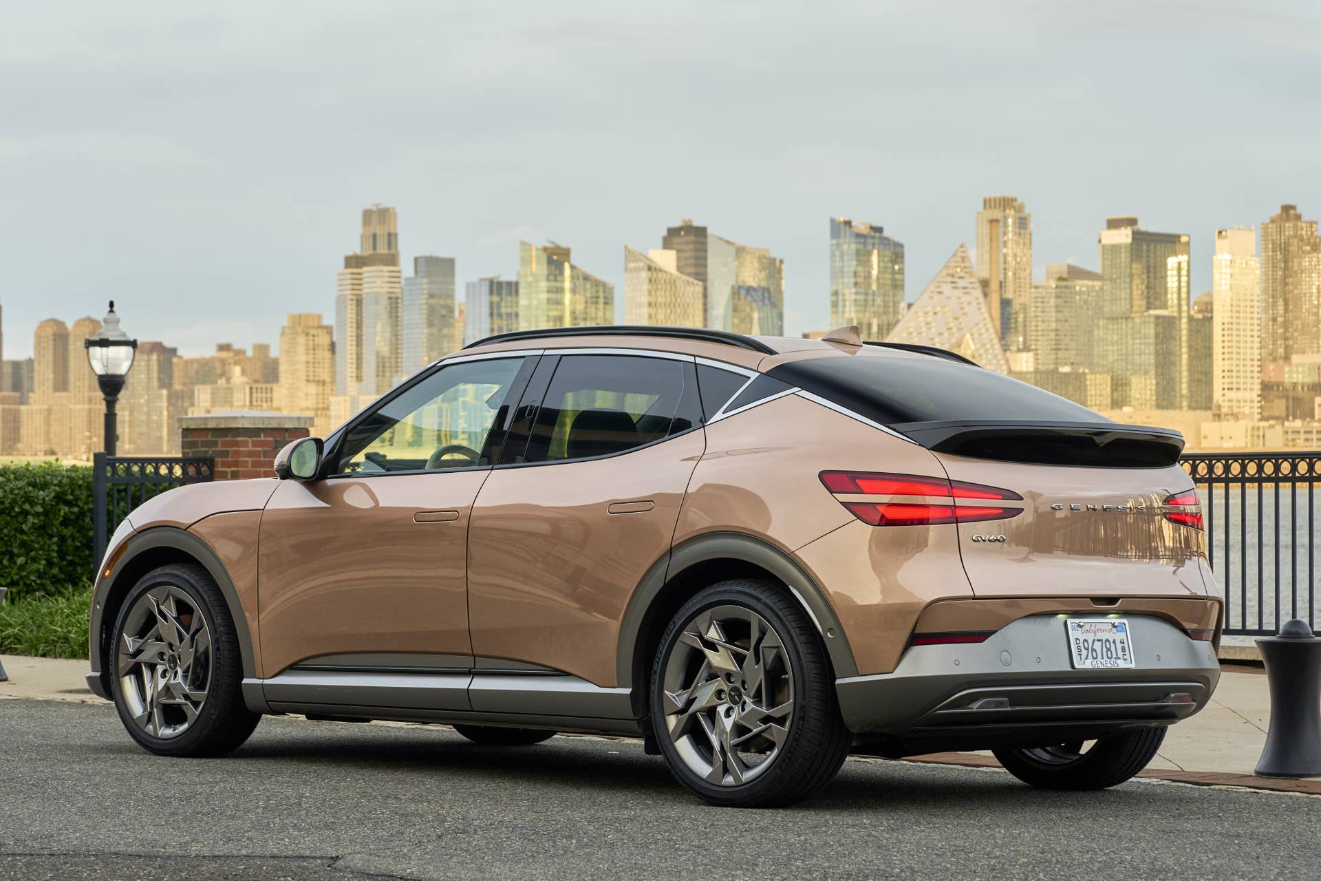 2025 Genesis GV60 gold rear angled view