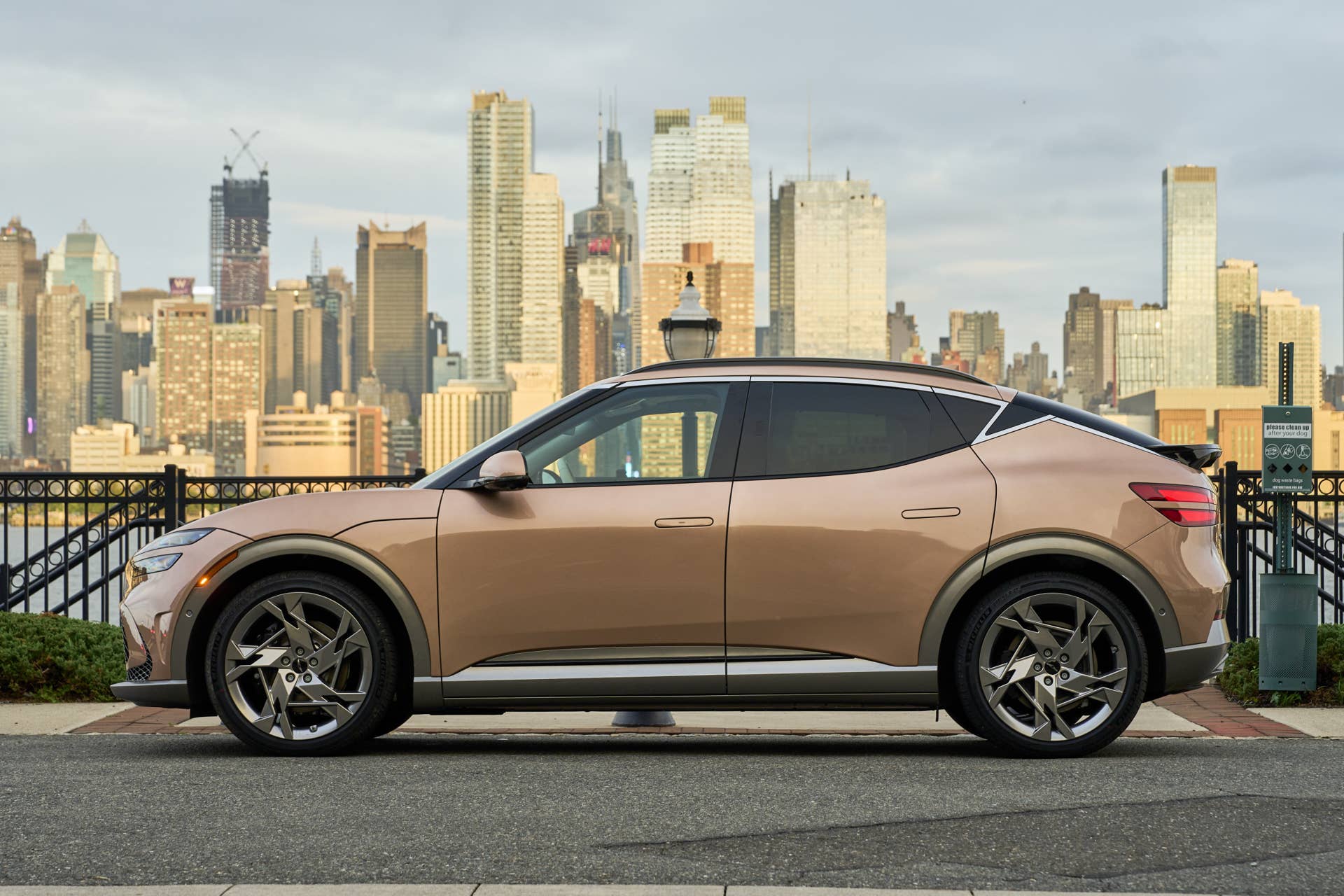 2025 Genesis GV60 gold side view