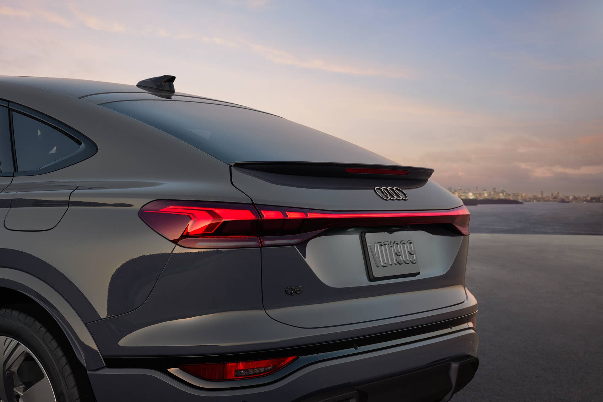 2025-2027 Audi Q6 e-tron Sportback gray rear angled view closeup