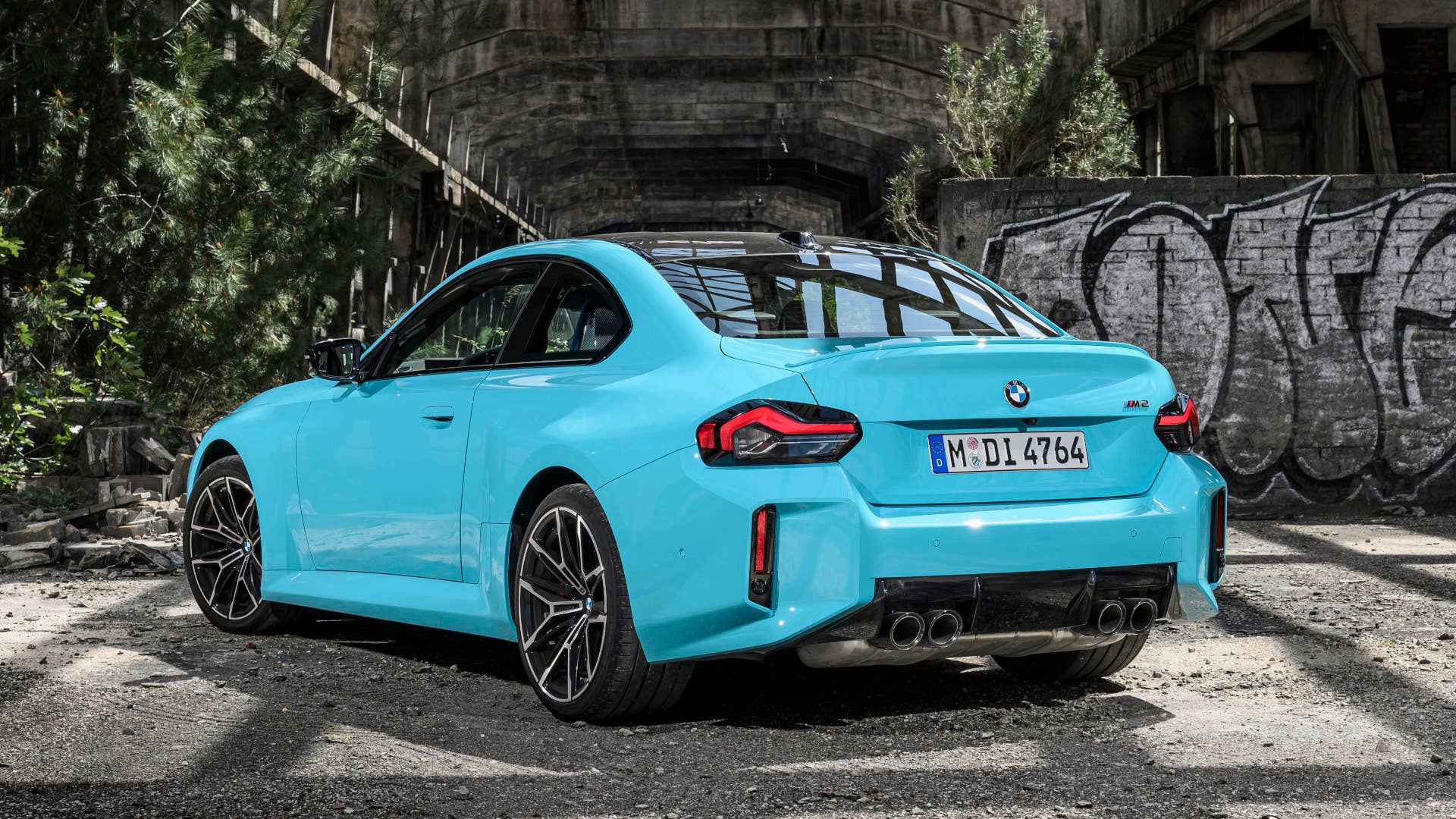 2027 BMW M2 xDrive in blue rear angled view
