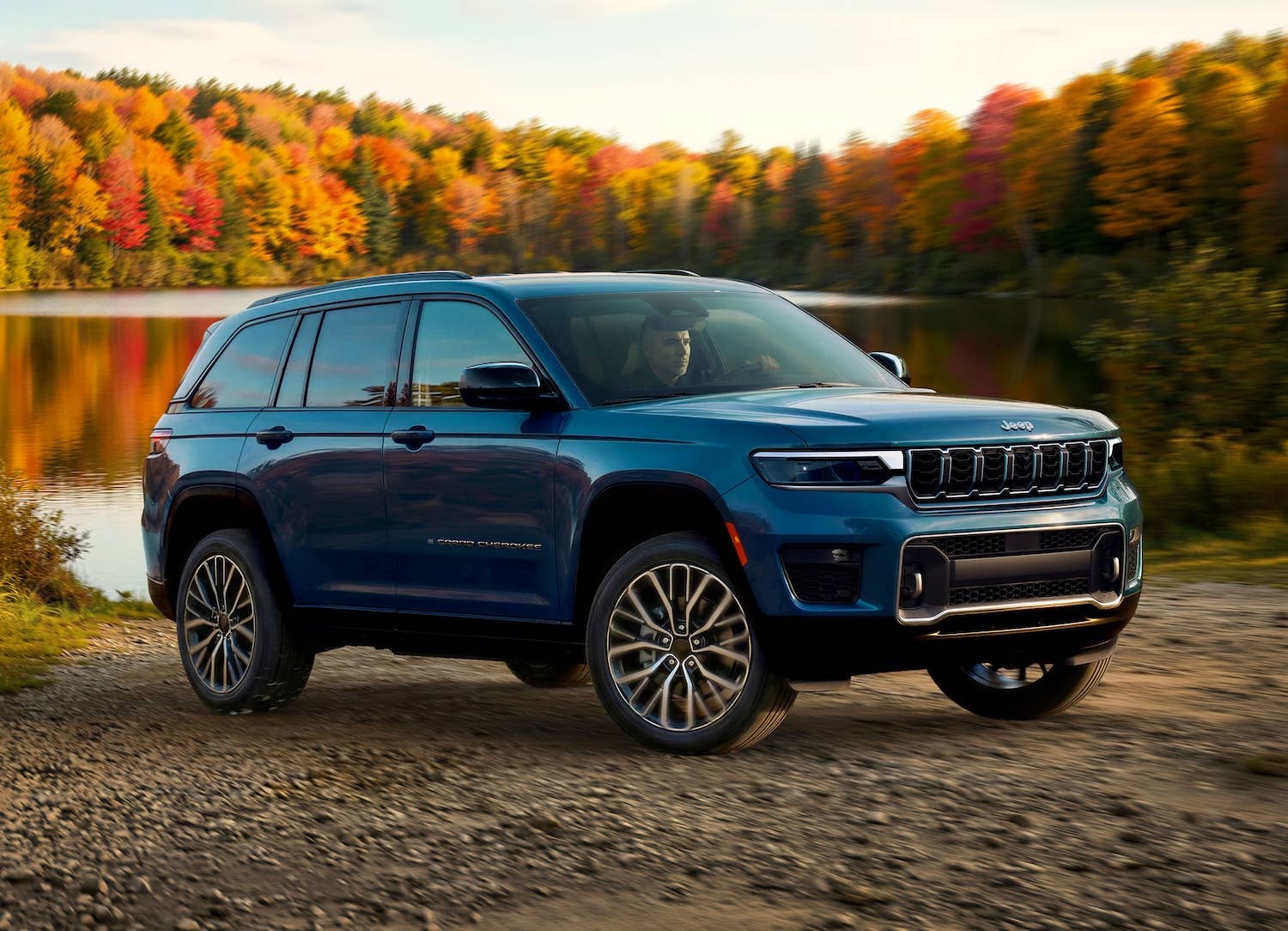2027 Jeep® Grand Cherokee Overland in blue on dirt