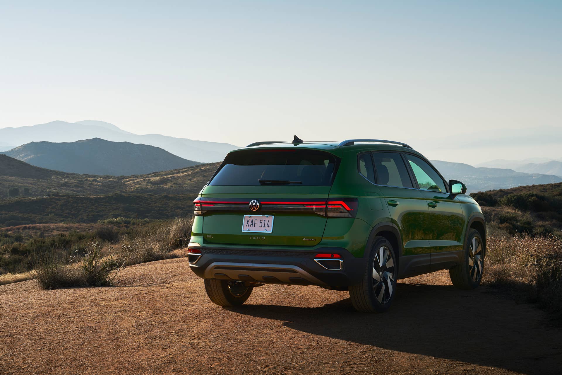 2025-2026 Volkswagen Taos in Bright Moss Green rear angled view
