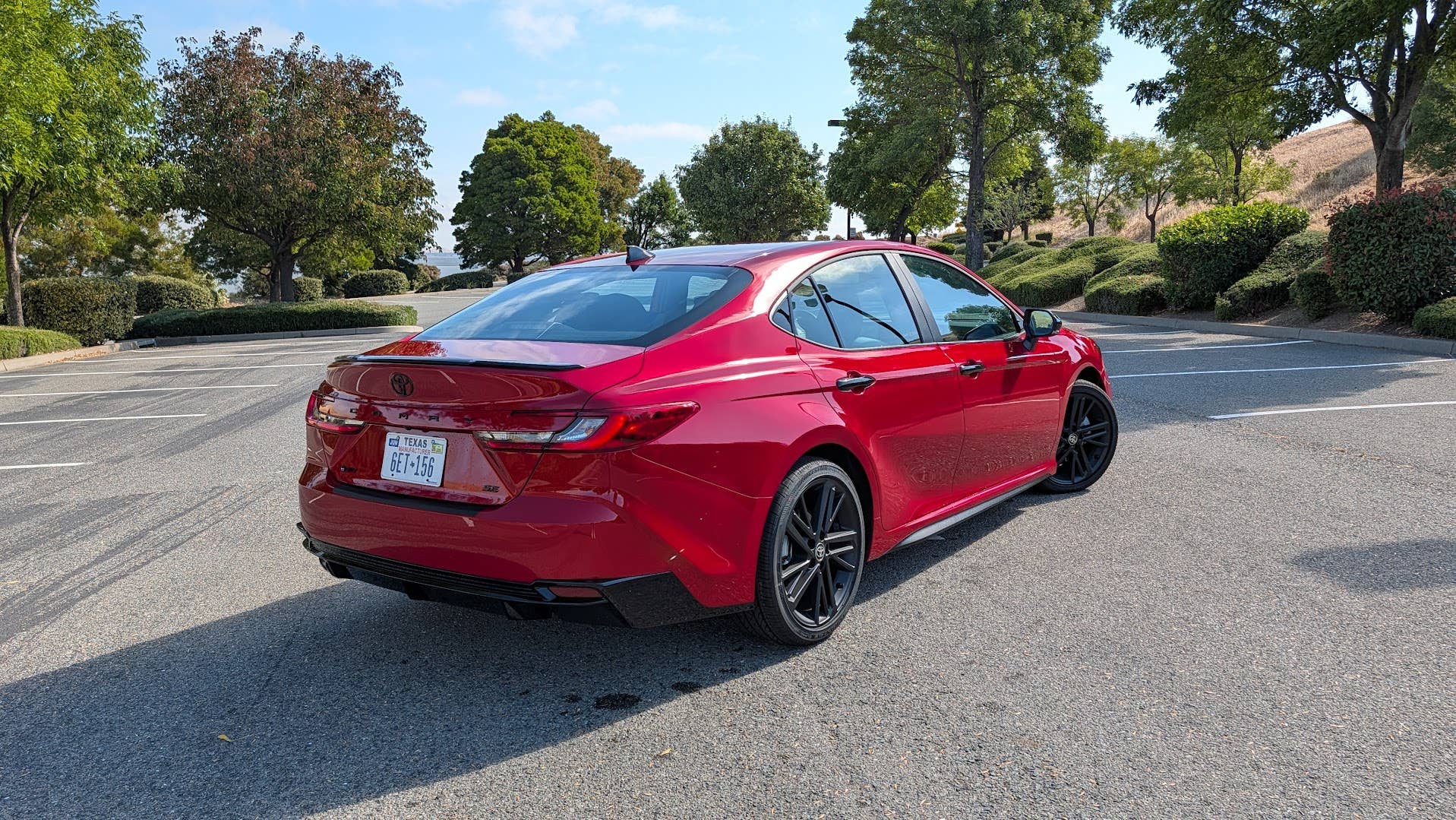 The rear quarter end of the 2026 Toyota Camry Nightshade Hybrid