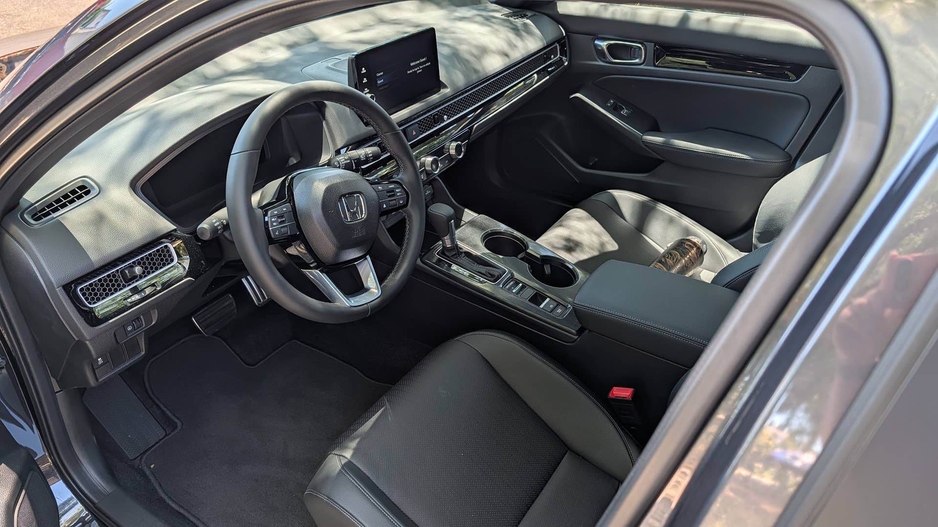 The interior of the 2026 Honda Civic Hatchback Hybrid
