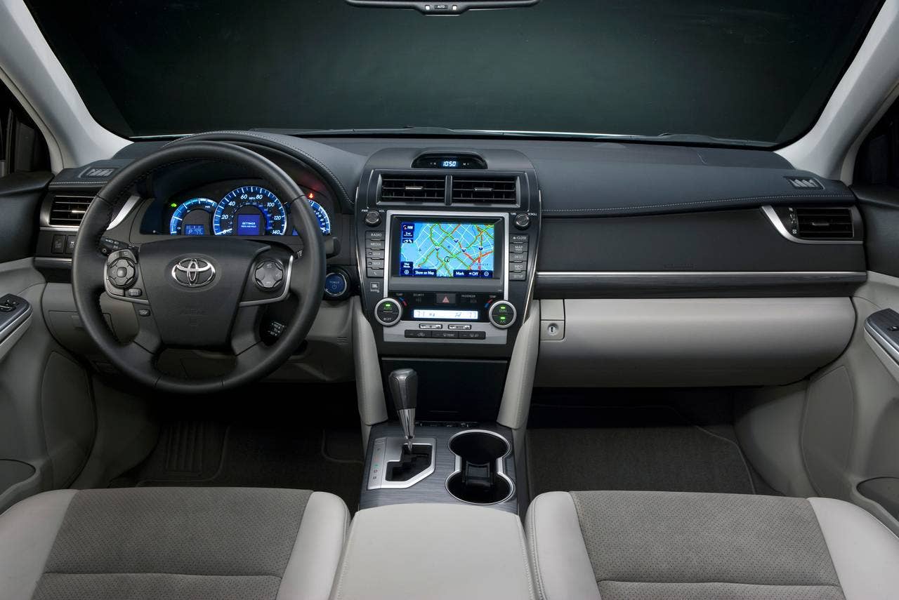 The interior layout of the 2014 Toyota Camry Hybrid XLE