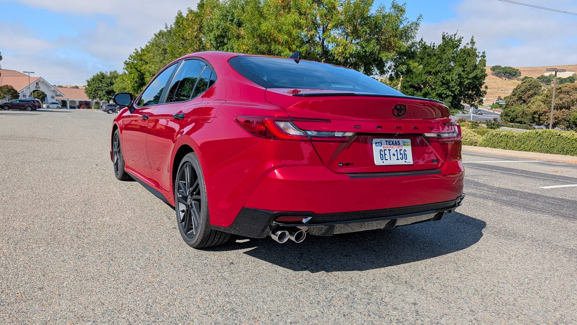 The rear quarter end of the 2026 Toyota Camry Nightshade