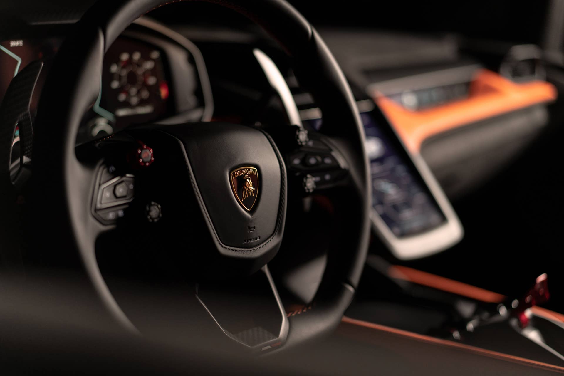 2025-2026 Lamborghini Revuelto black and orange interior steering wheel