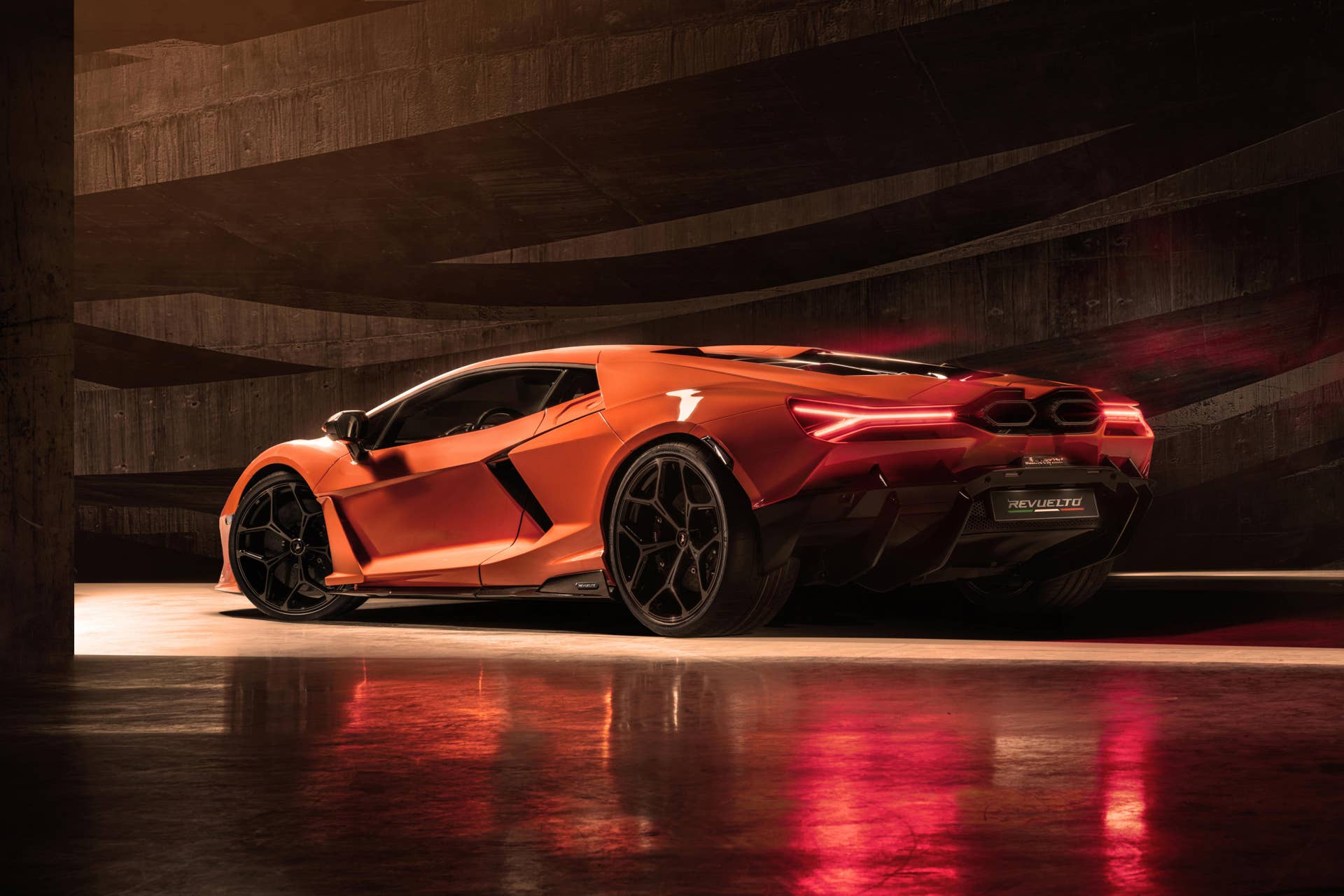 2025-2026 Lamborghini Revuelto in Arancio Borealis paint rear angled view