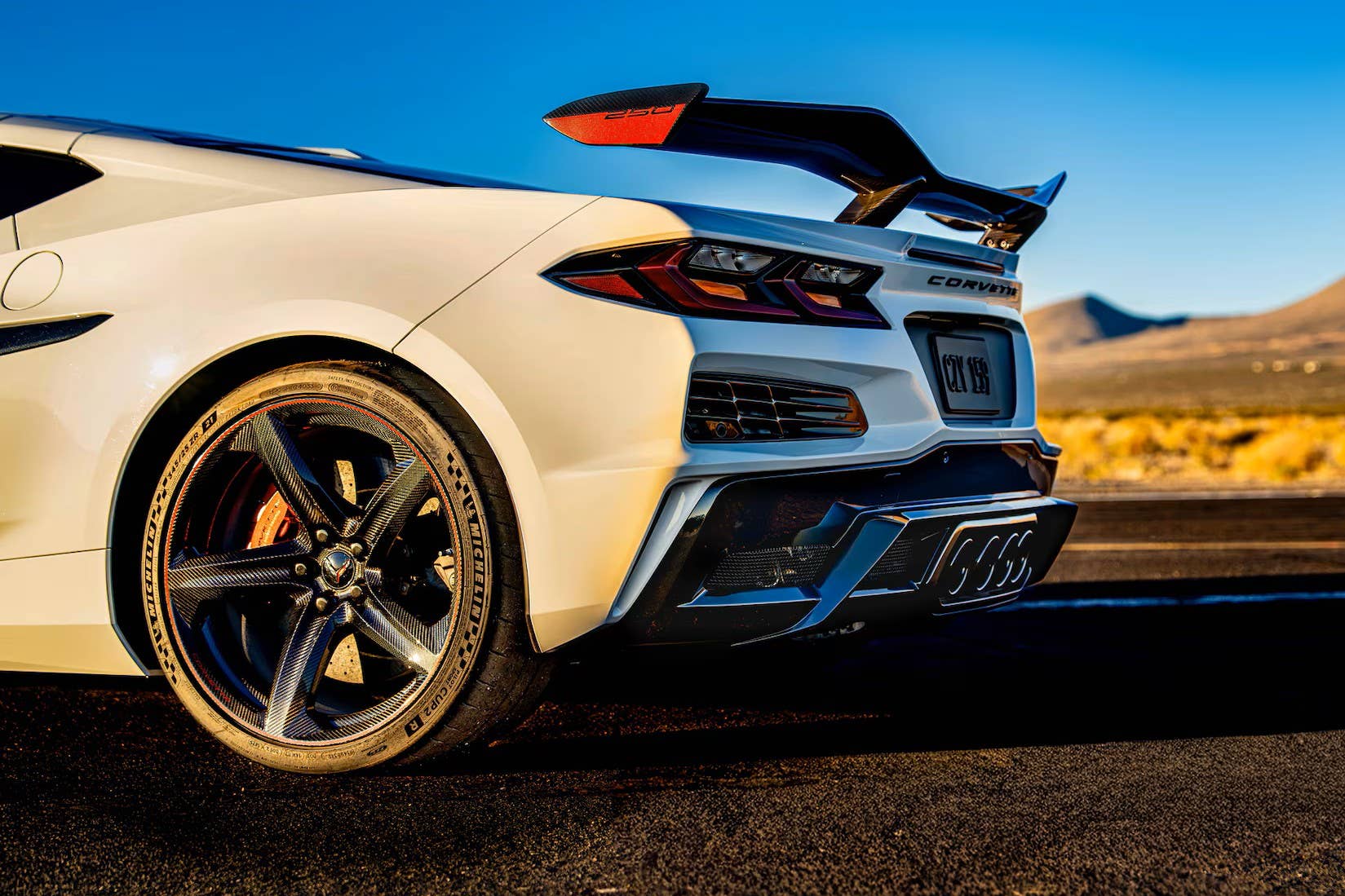 2026 Chevrolet Corvette Z06 Coupe Stars & Steel in Arctic White rear angled view closeup