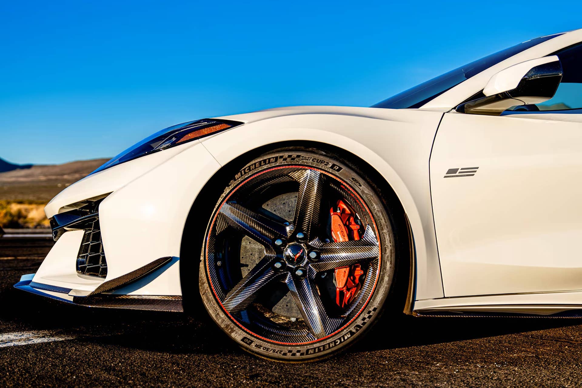 2026 Chevrolet Corvette Z06 Coupe Stars & Steel in Arctic White front angled view closeup