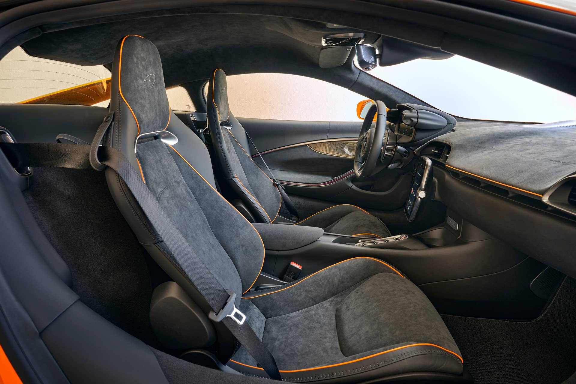 2025-2026 McLaren Artura Coupe gray and orange interior side view