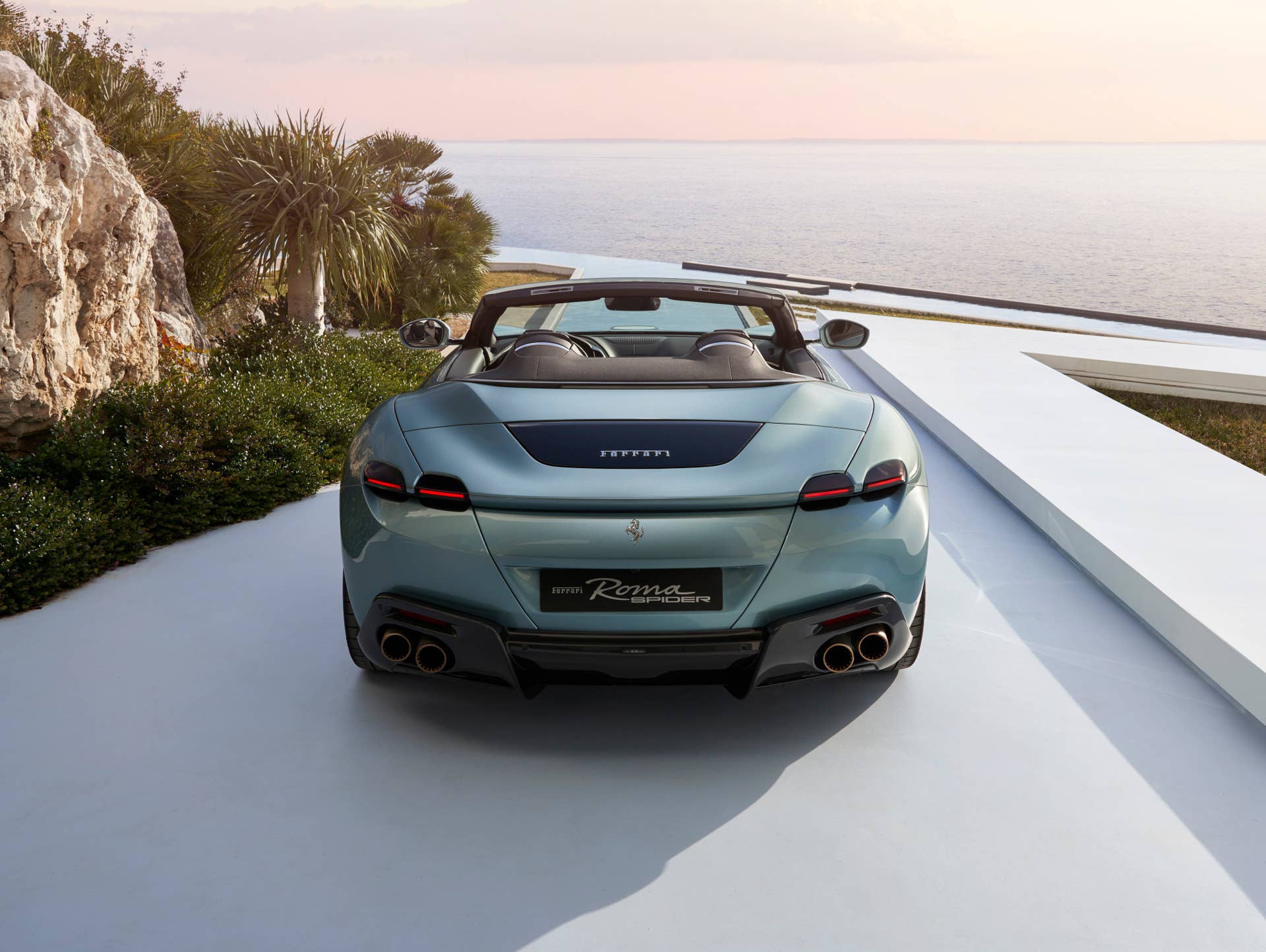 2025-2026 Ferrari Roma Spider top down in blue rear view
